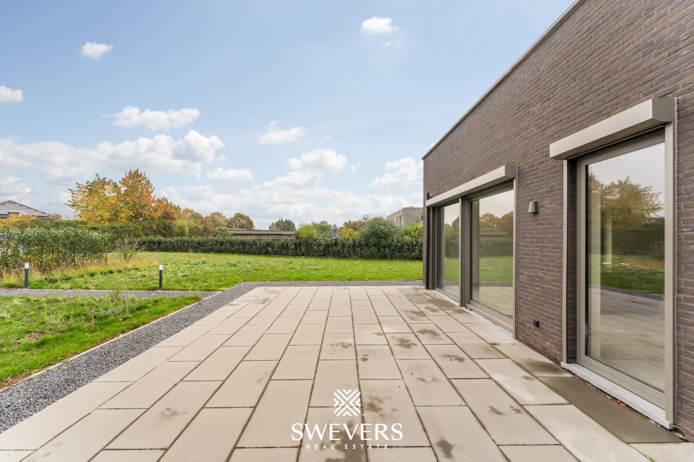 Stijlvol, gelijkvloers en instapklaar appartement (208 m²) mét private tuin en private kelder vlakbij Zolder-centrum foto 7