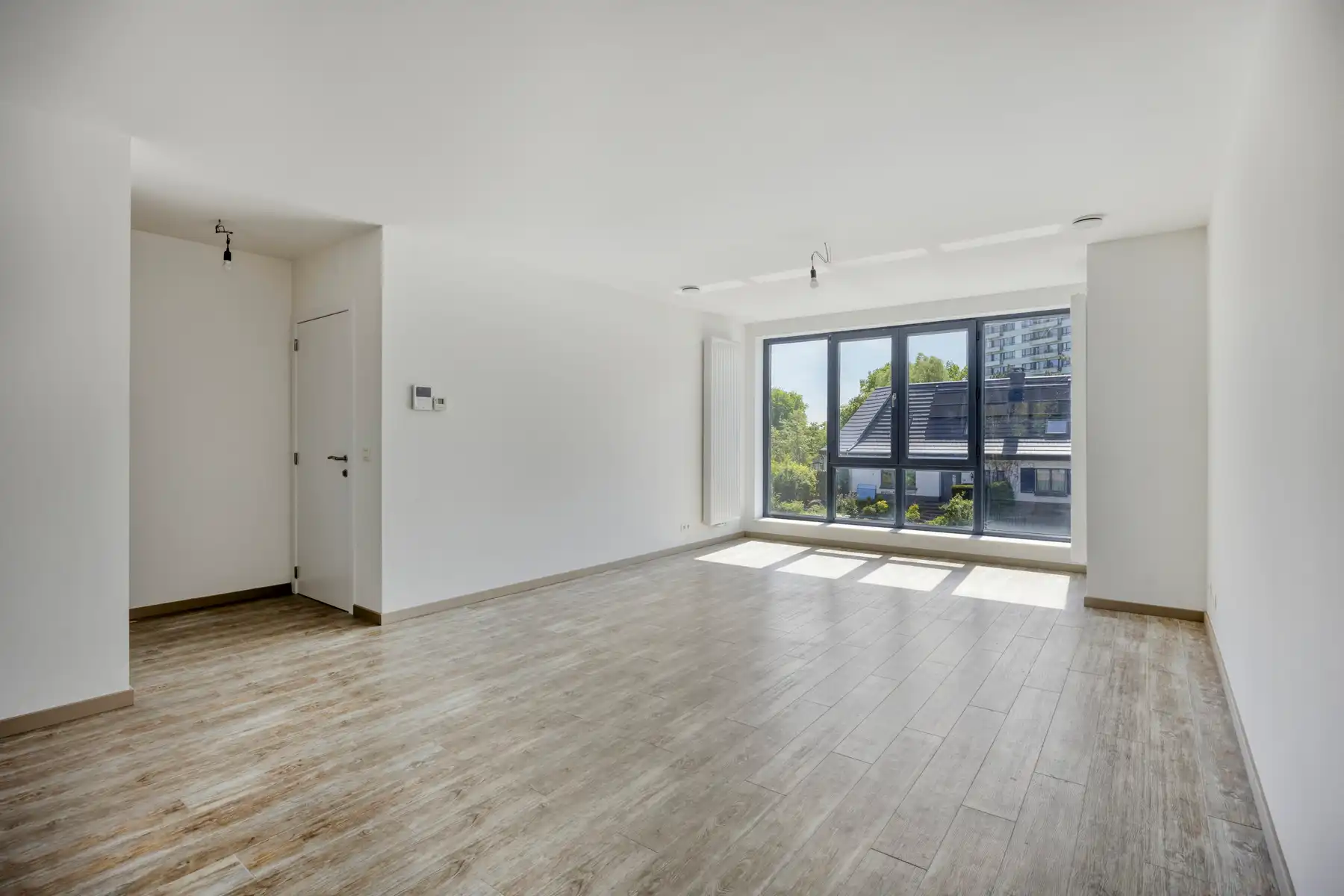 Nieuwbouw triplex met 4 slaap- en badkamers, tuin en parking foto 3