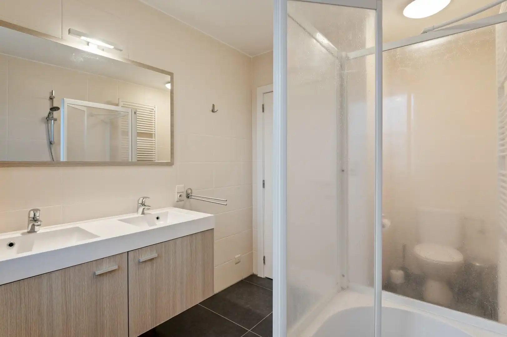 Instapklare duplex met 3 slpkmrs, terras, staanplaats en carport in Hulshout foto 12