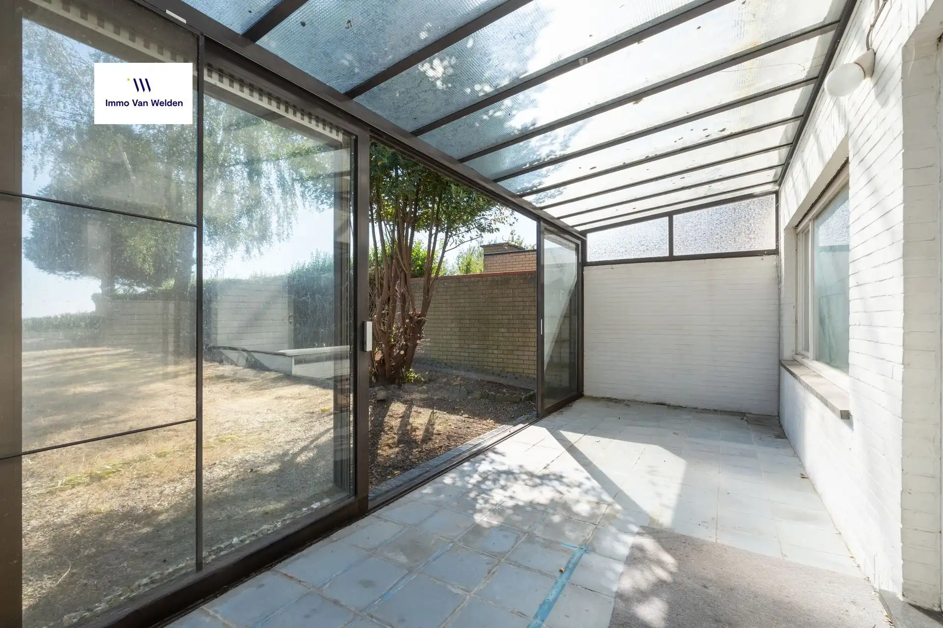 Te renoveren halfopen woning met garage en tuin in landelijke omgeving te Wortegem-Petegem. foto 9