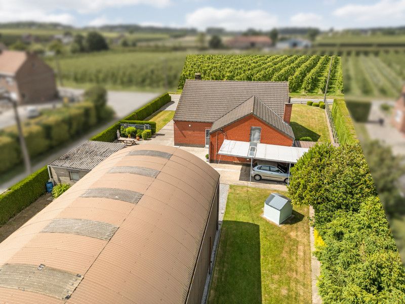 Ruime woning met loods op een perceel van 14are foto 42