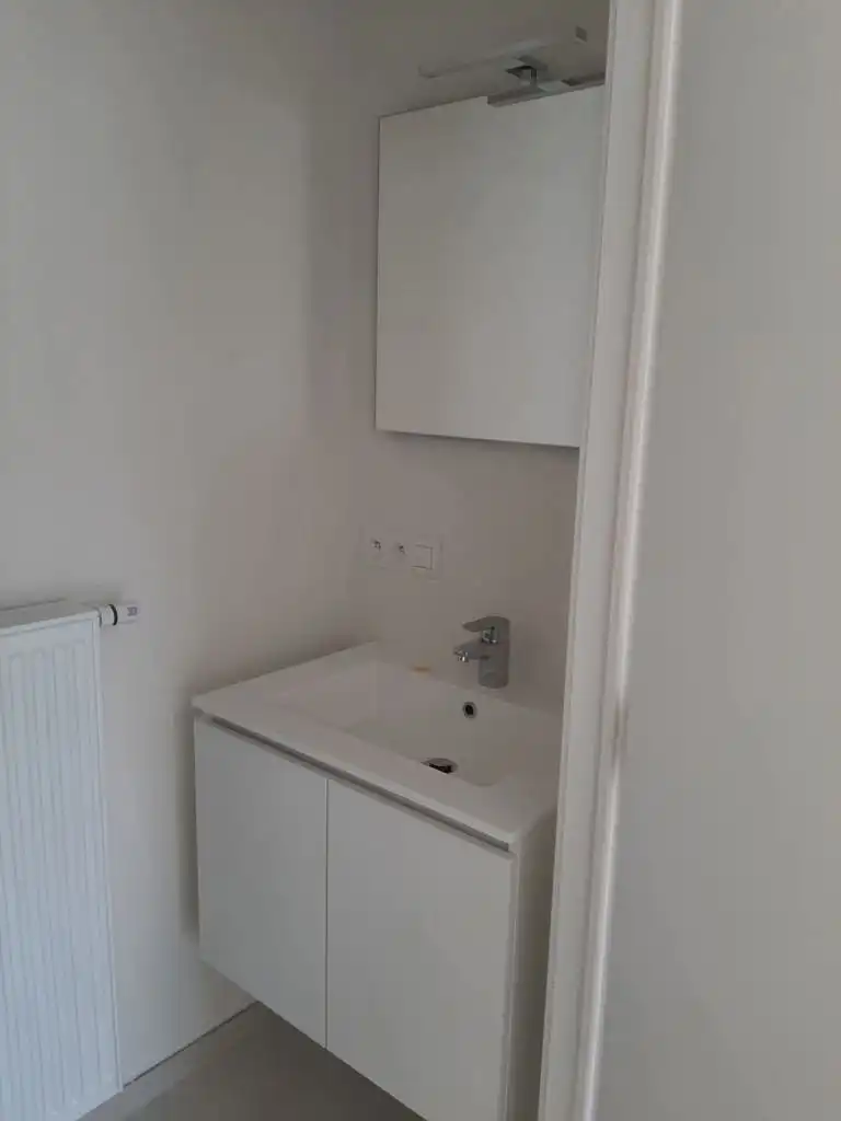 Tweekamerappartement met terras en twee binnenstaanplaatsen foto 7