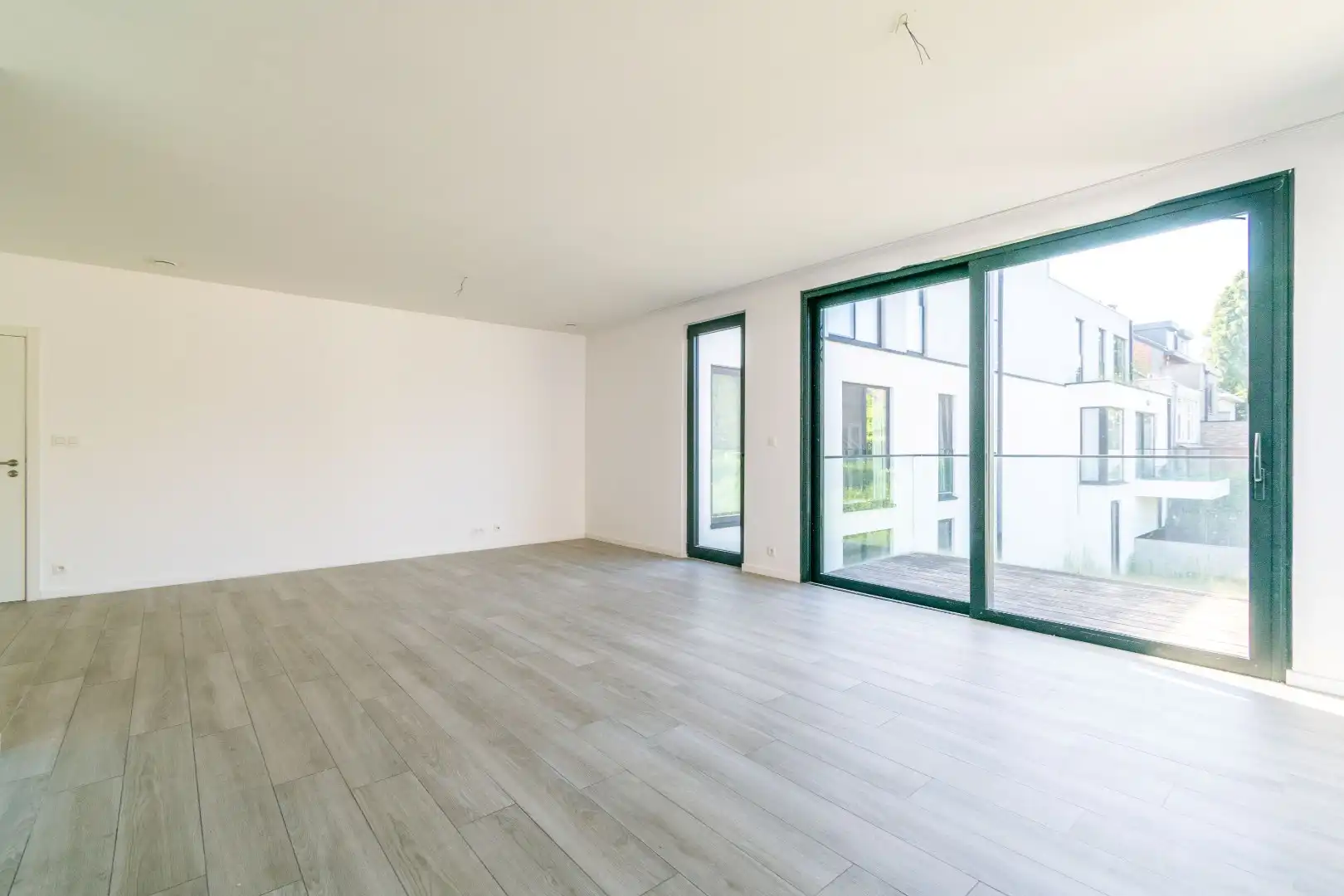 Een ruim (116m²), recent nieuwbouwappartement te Dilbeek! foto 7