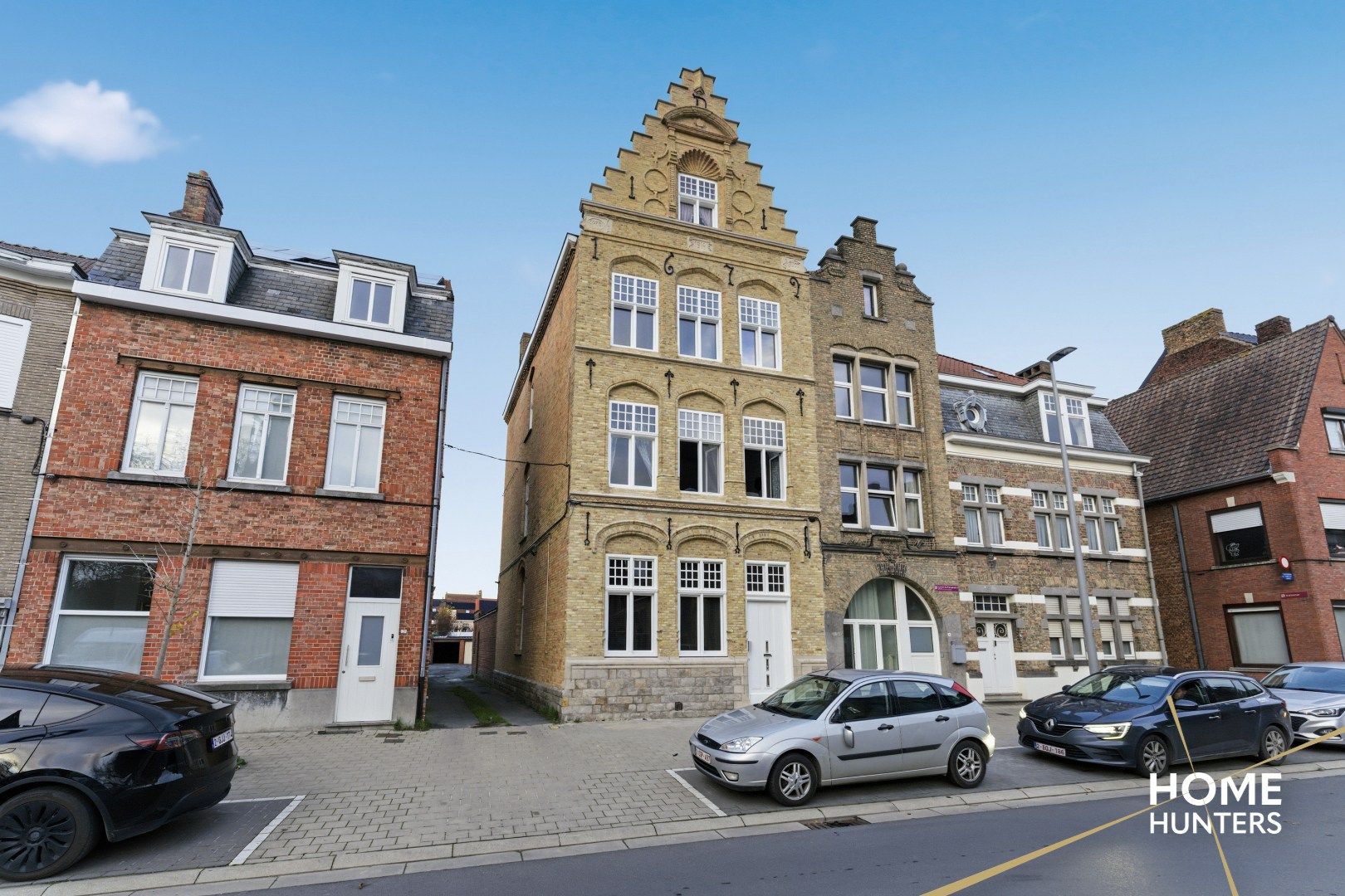 Ruim éénslaapkamer appartement met uniek zicht op het astridpark en de Sint Maartens Kathedraal te Ieper foto 2