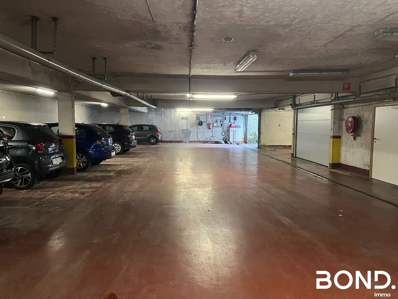 Ondergrondse autostostaanplaats te huur in het centrum van Leuven foto 2