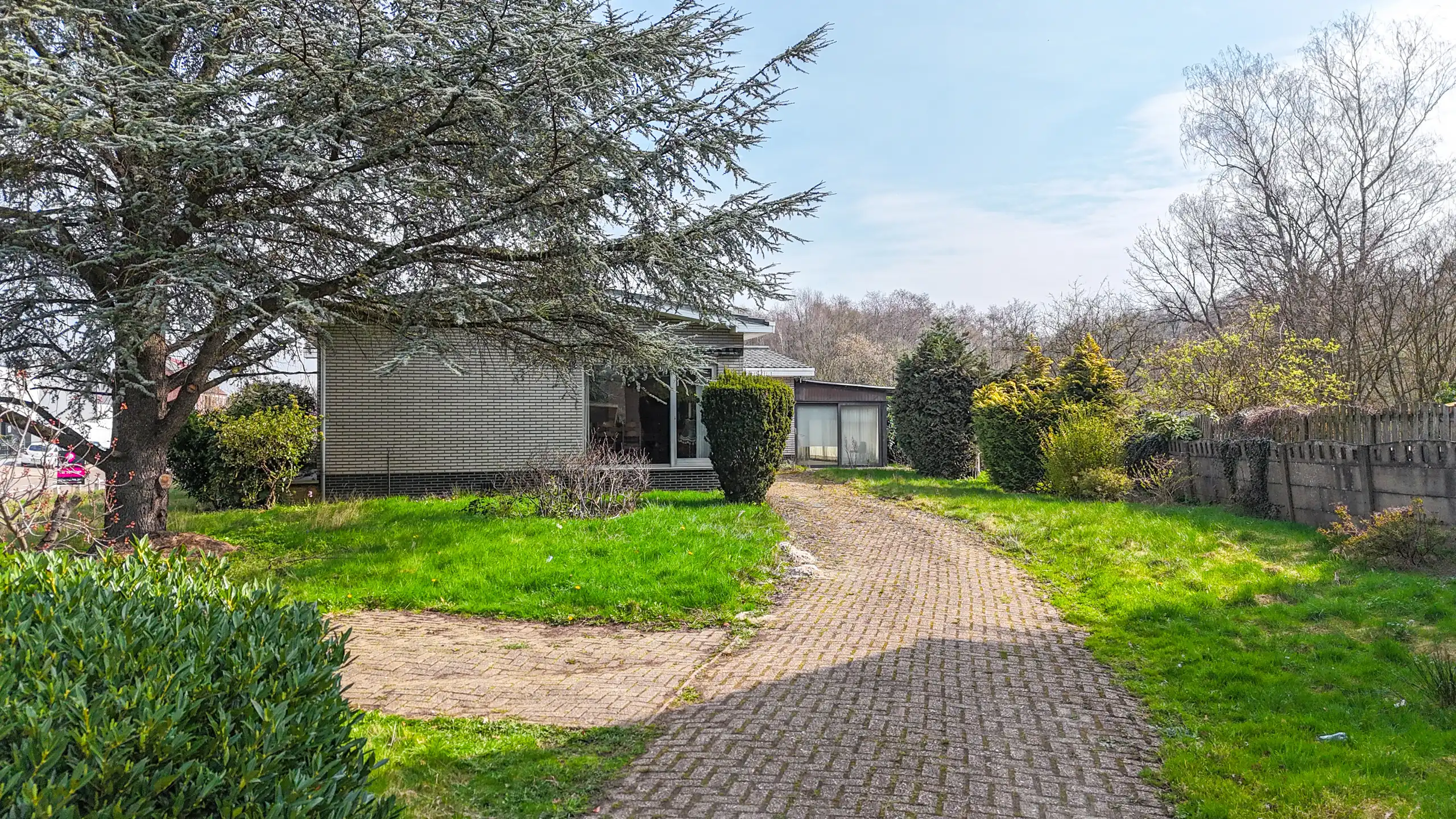 Rustig gelegen bungalow op zeer ruim perceel in Heusden! foto 24