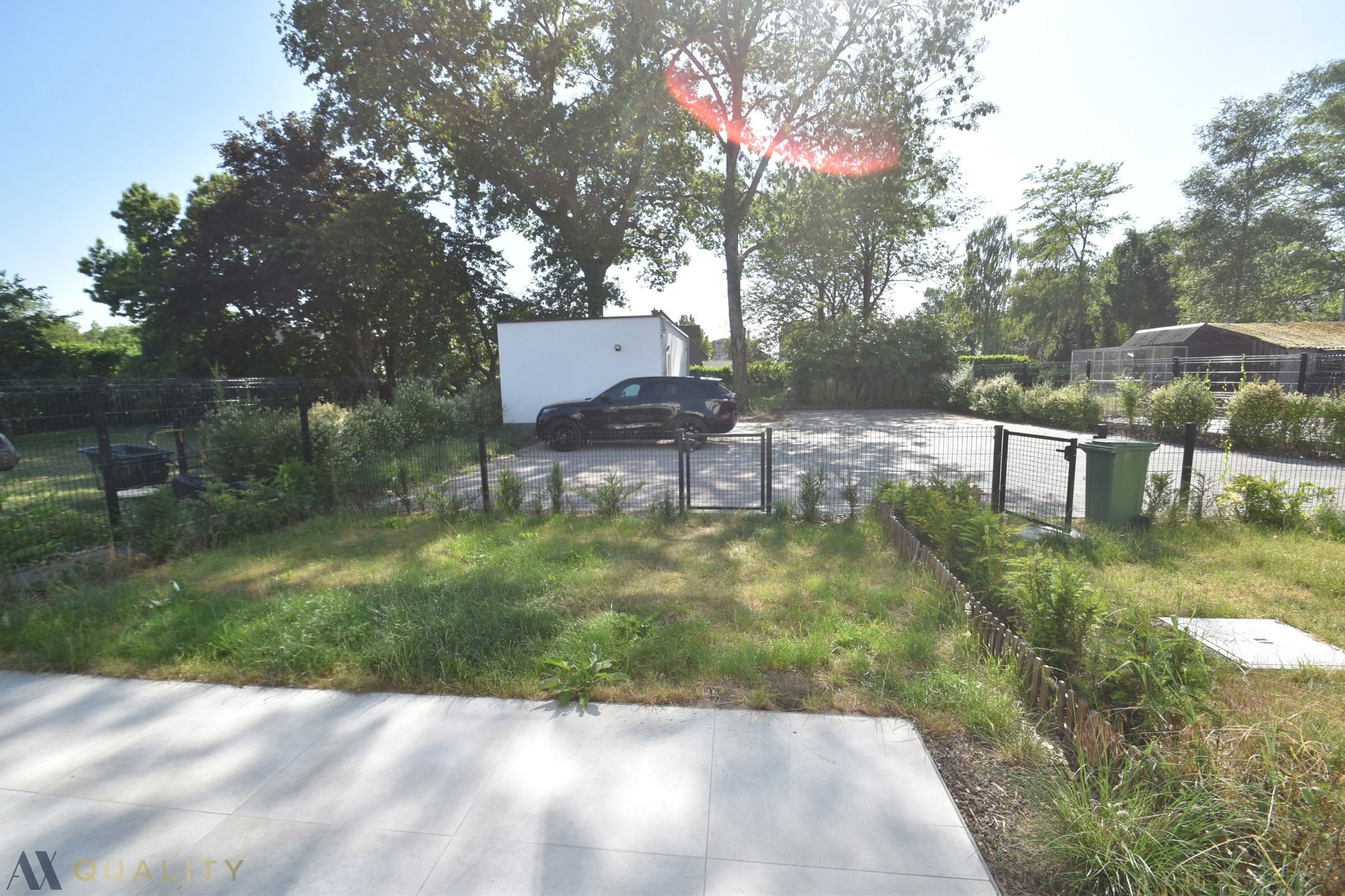 Energiezuinig recent gelijkvloers 2-slpk. appt met terr., tuin en autostaanplaats foto 18