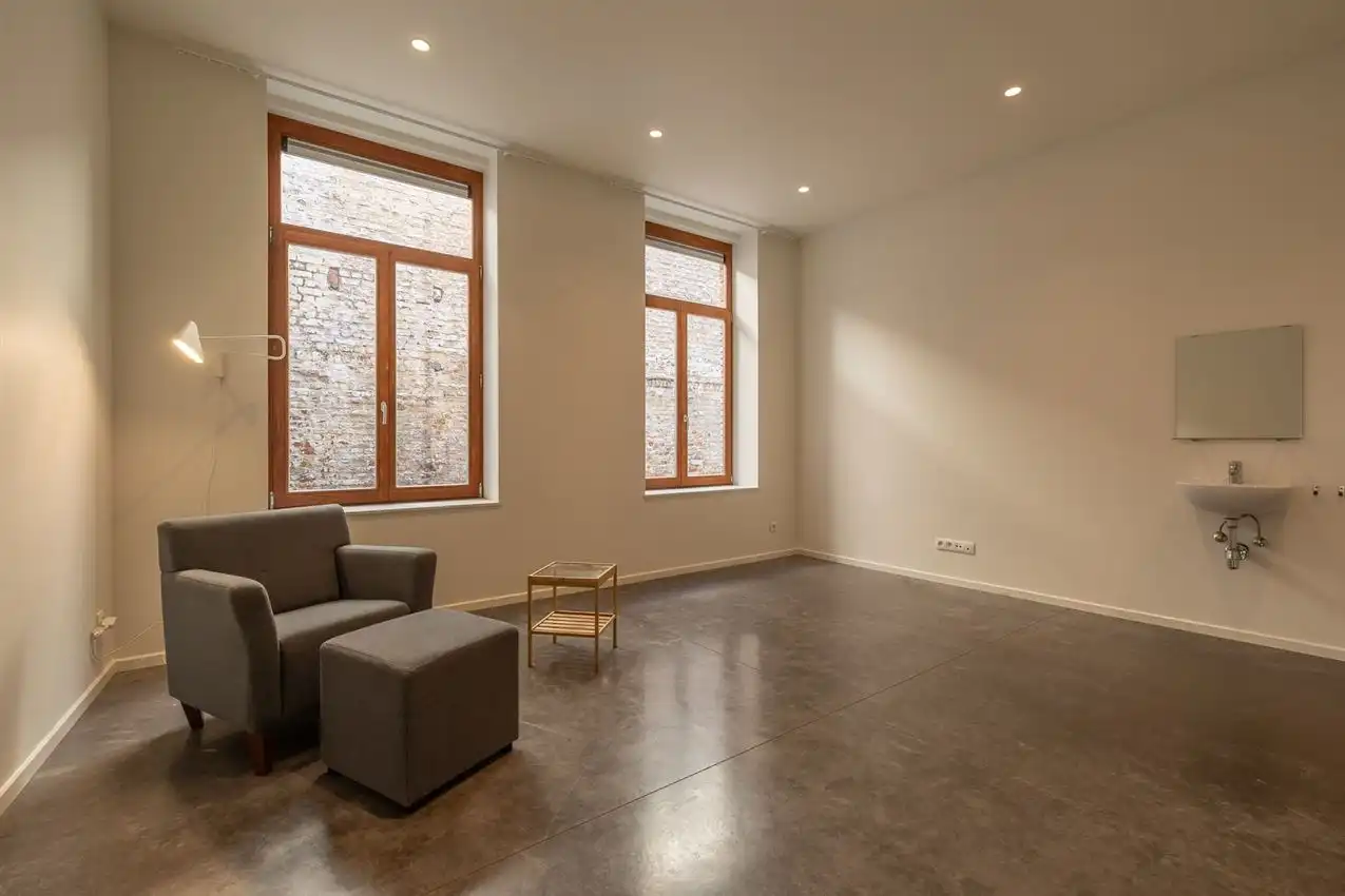 Ruim gelijkvloers appartement met zonnige tuin op toplocatie foto 13
