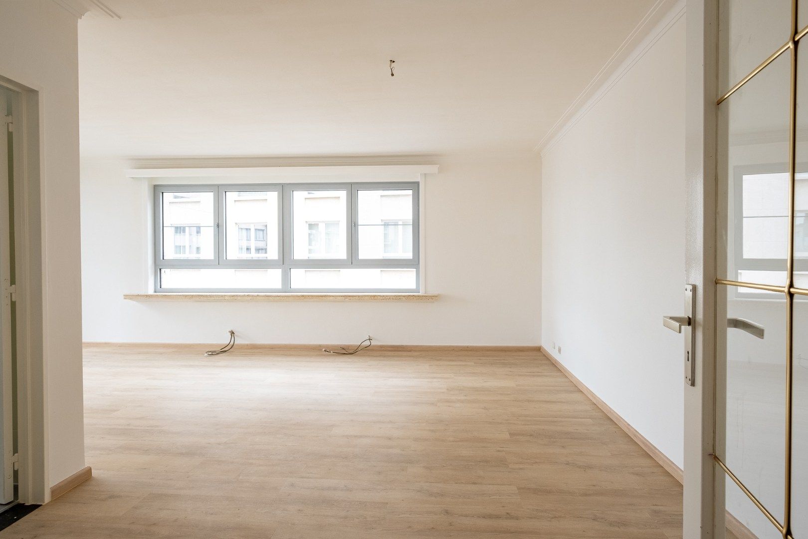 Ruim 3-slaapkamer appartement (95 m²) op de 1ste verdieping met lift aan centrum Beveren!  foto 2