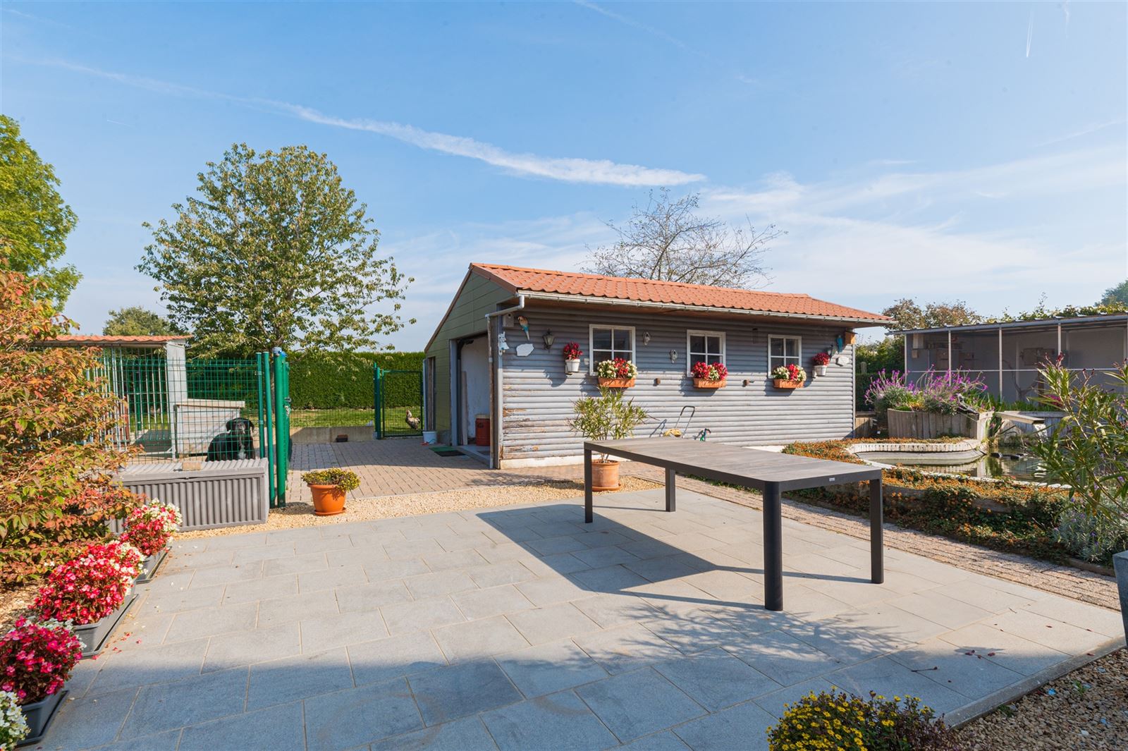 Villa met tuin, garage en 4 ruime slaapkamers op +/-12 are foto 3