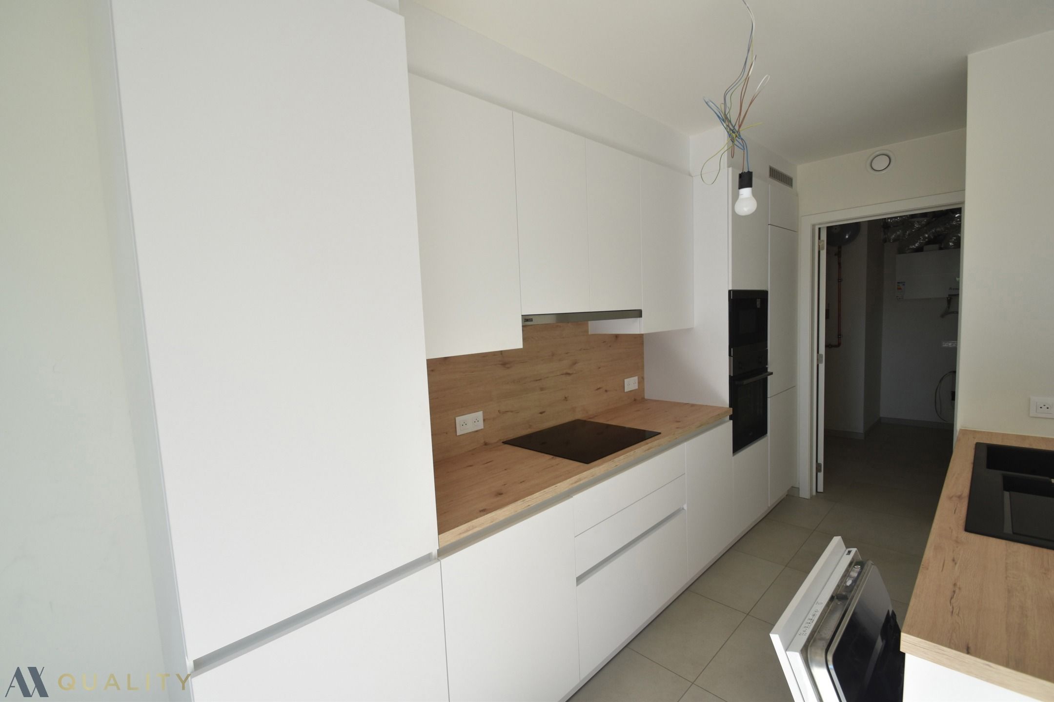 Energiezuinig recent gelijkvloers 2-slpk. appt met terr., tuin en autostaanplaats foto 6