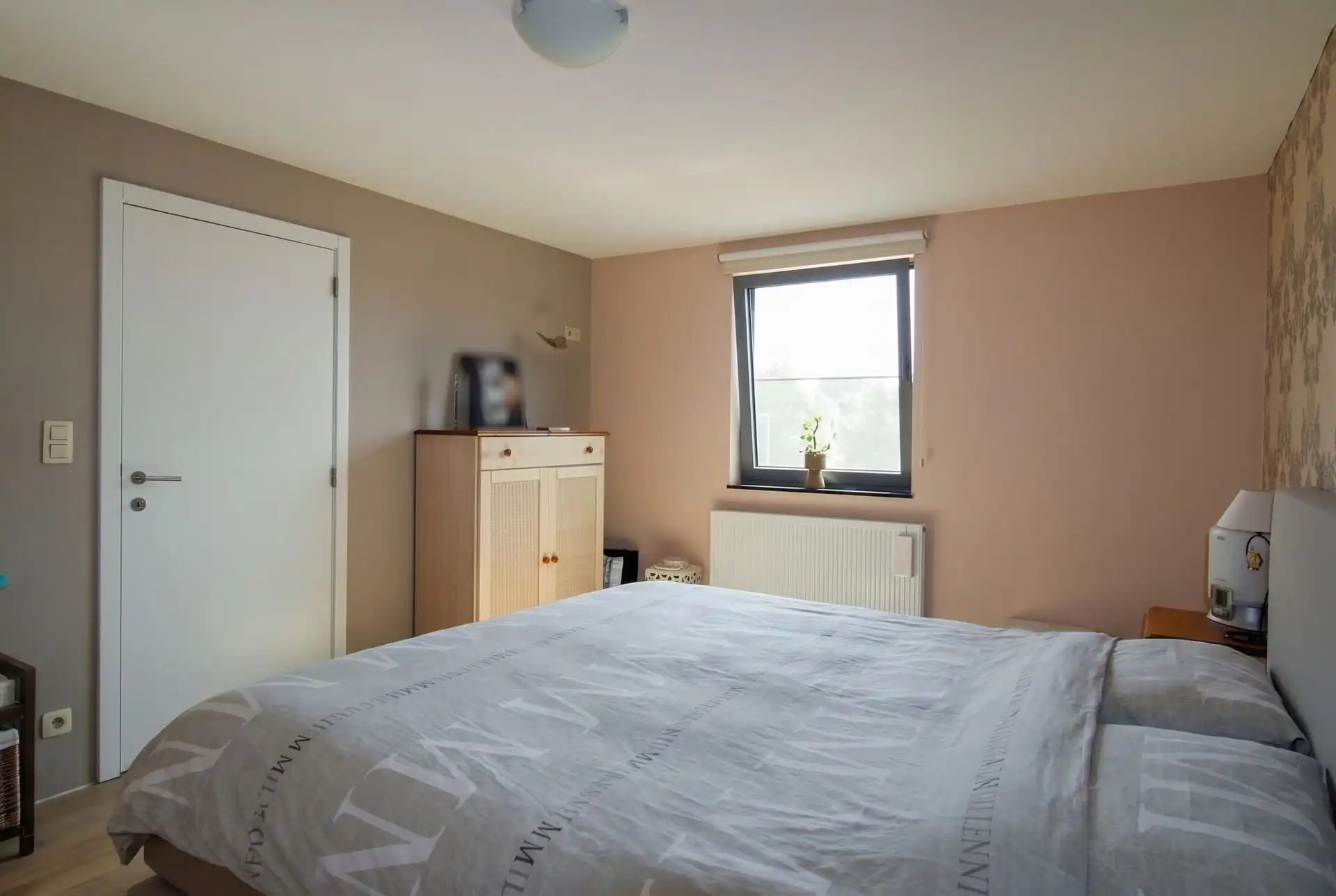 Instapklaar duplexappartement met inpandige garage, zuidgericht terras en 2 slaapkamers op mooie locatie in Maasmechelen! foto 9