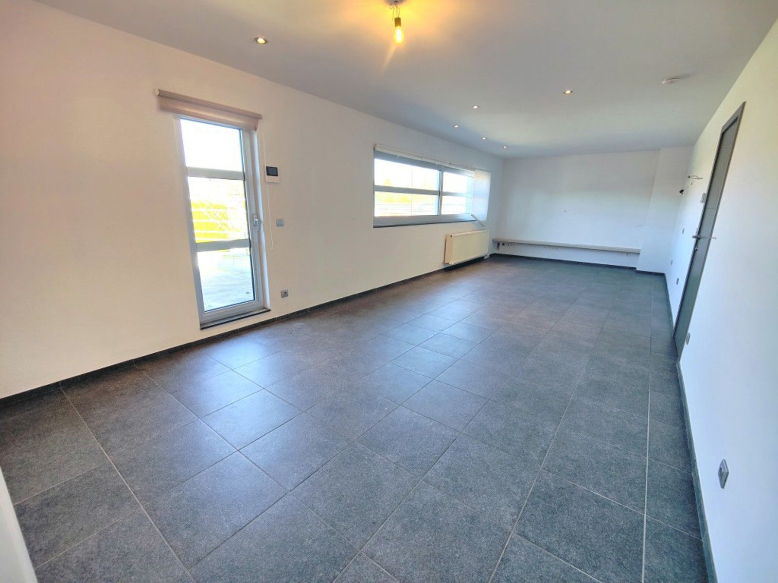 Ruim multifunctioneel pand met tuin foto 19