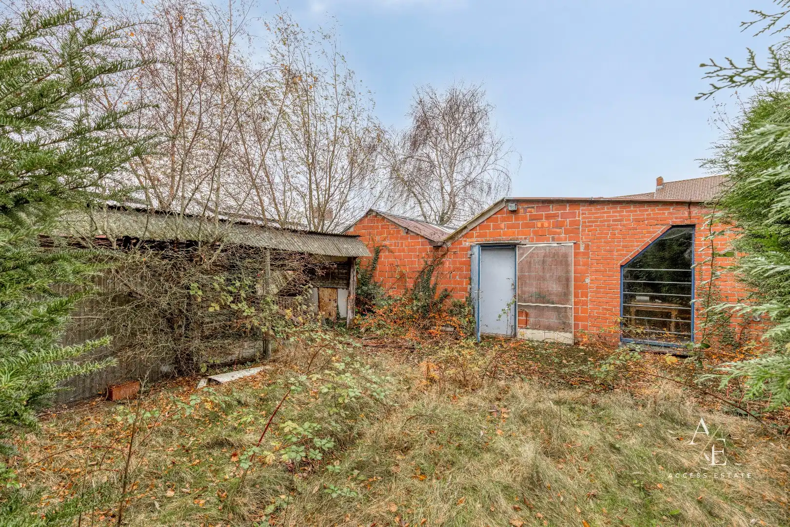 EEKLO - Te renoveren handelshuis met grote bruikbare oppervlakte en tuin foto 11