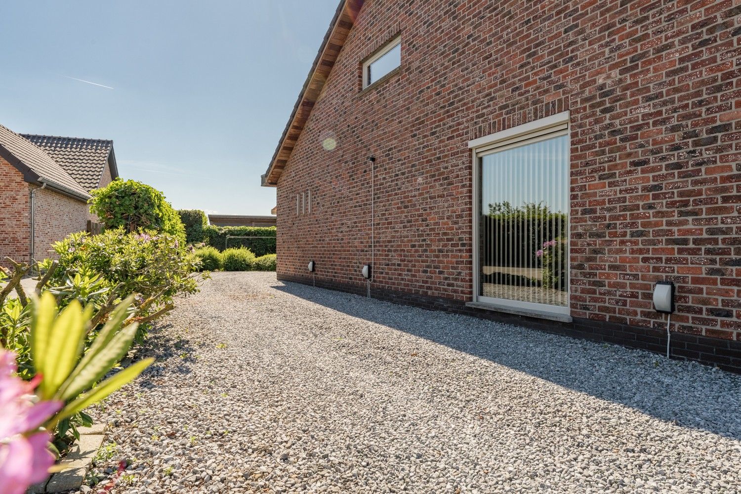 Gelijkvloerse 3 SLK woning op een mooi onderhoudsvriendelijk perceel foto 5