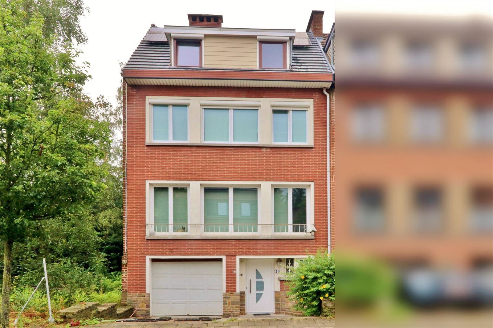 Woning met 4 slaapkamers, tuin en garage foto 1