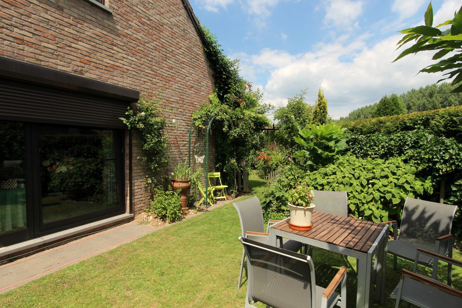 Charmante woning met veranda en mooie tuin in een rustige, landelijke omgeving foto 26