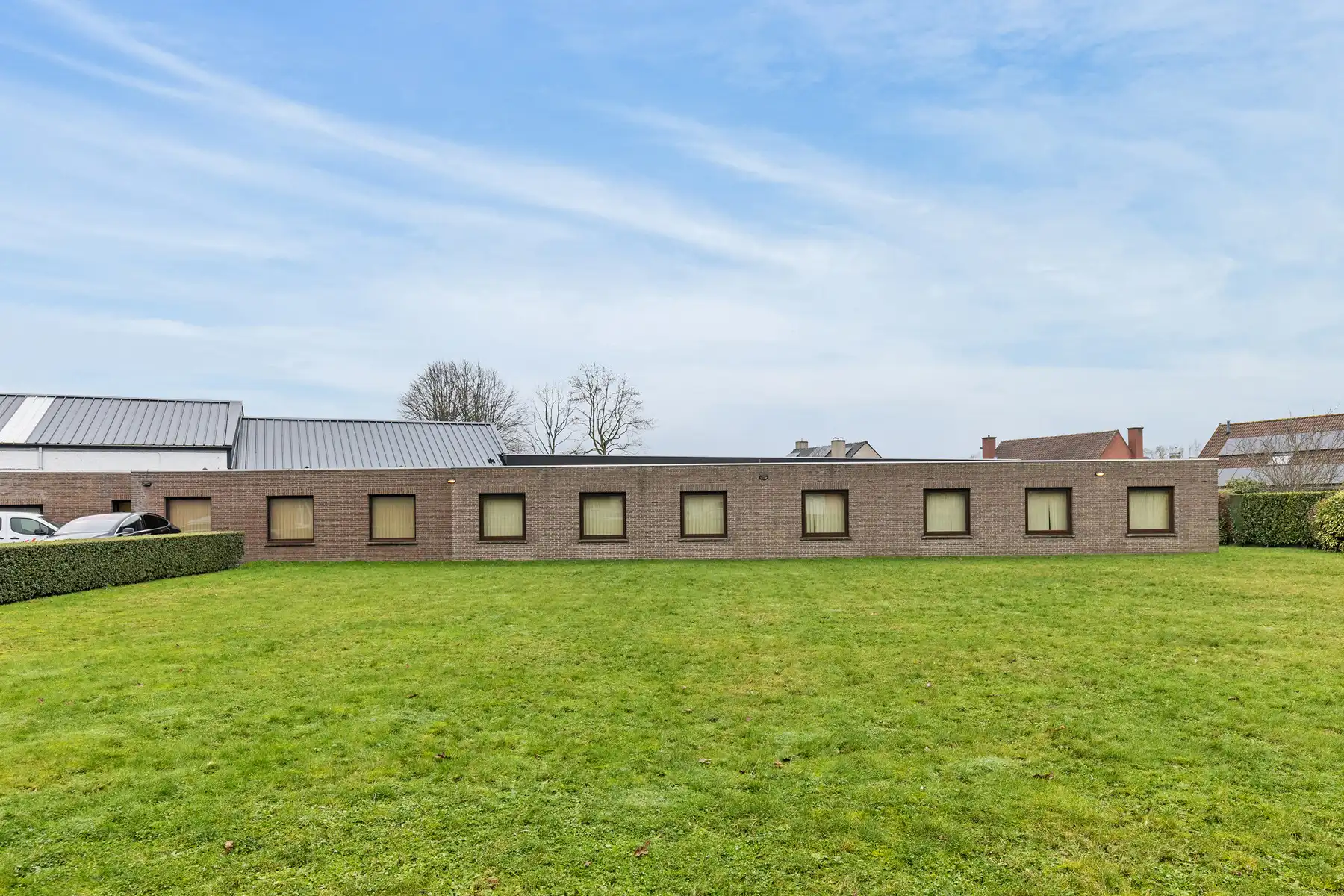 Bedrijfsgebouwen met woonst en gronden op 5.975 m² foto 2