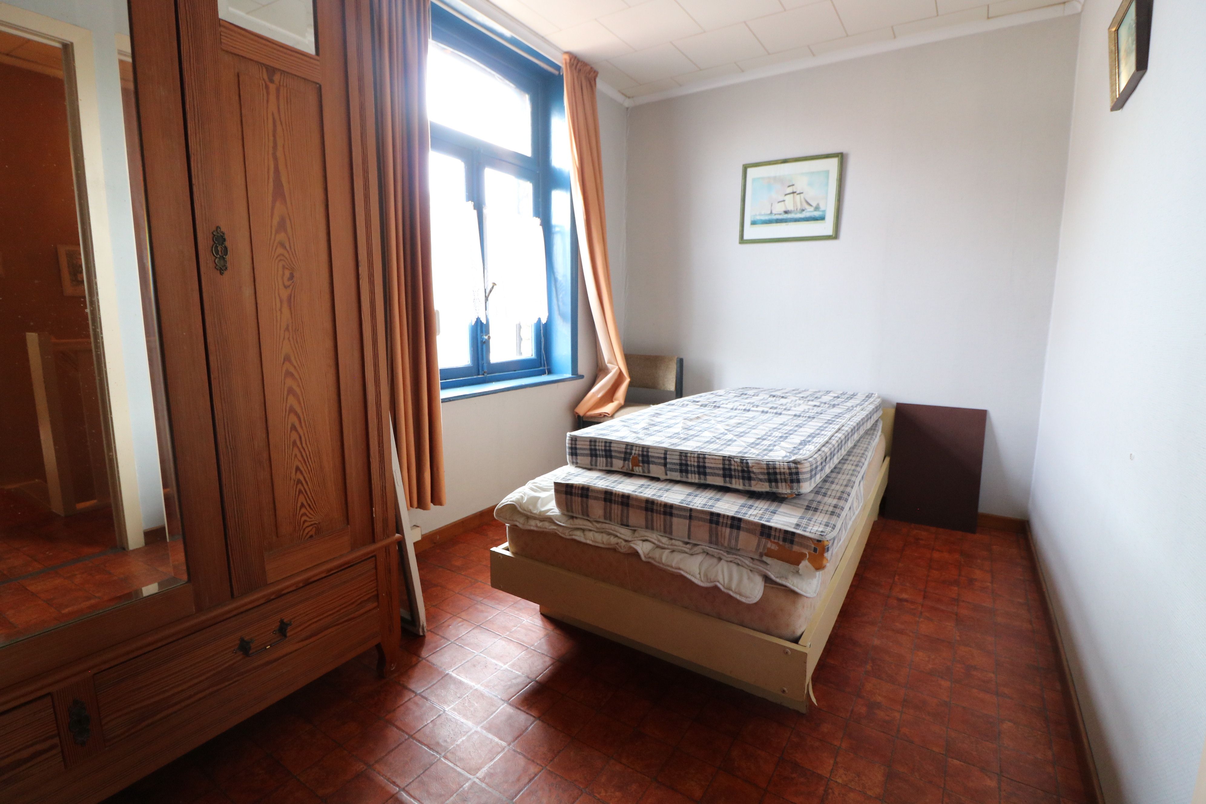 Goed verzorgde rijwoning met 3 slaapkamers en tuin, op wandelafstand van het centrum. foto 4