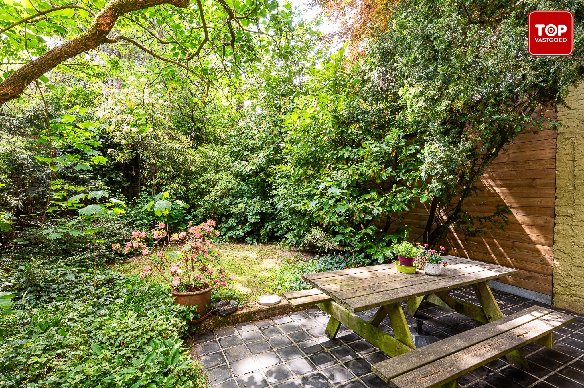 Charmante halfopen woning met fantastische tuin op een Topligging in Sint-Denijs-Westrem foto 15