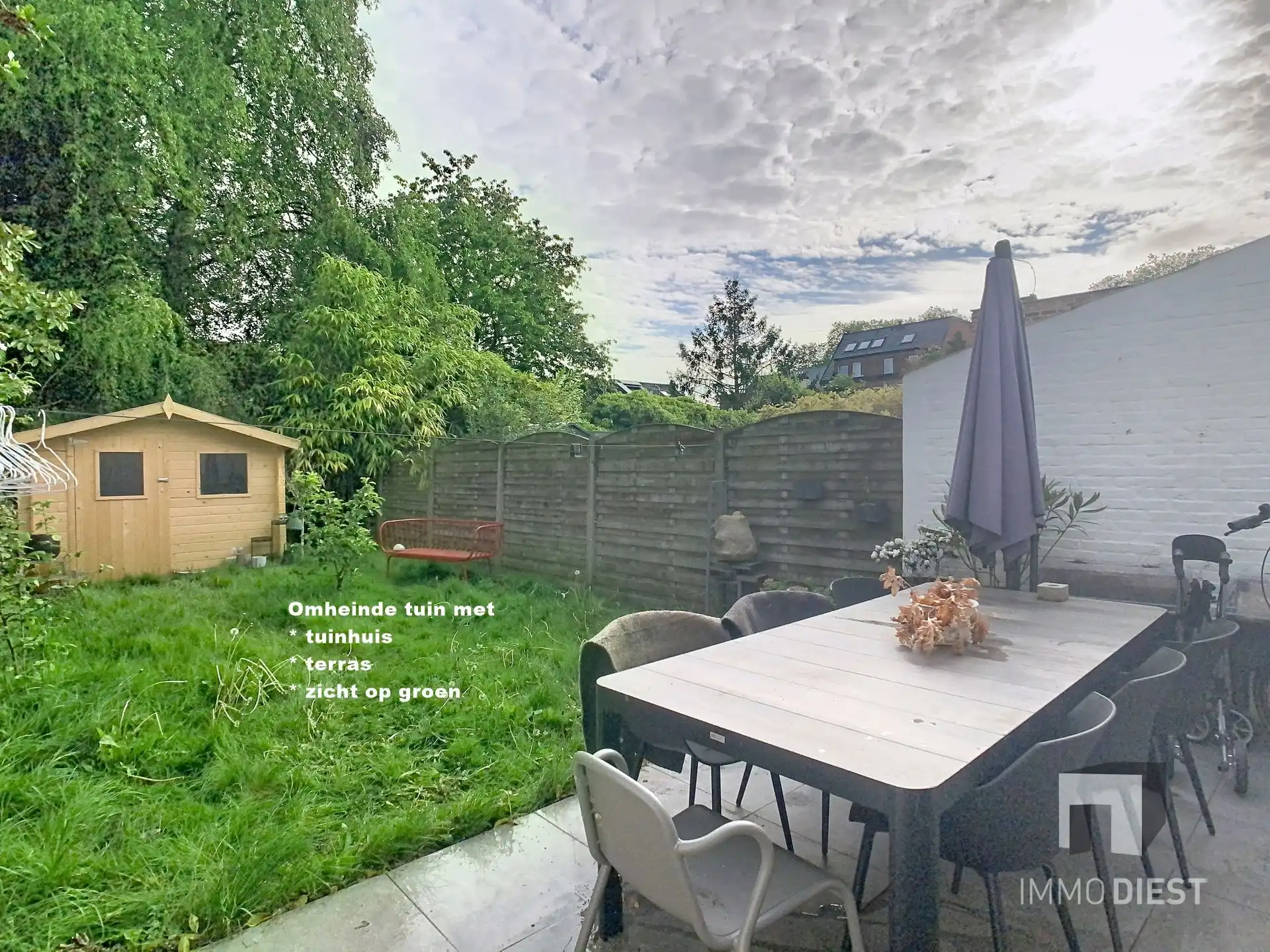 Knappe rijwoning met tuin en terras foto 2