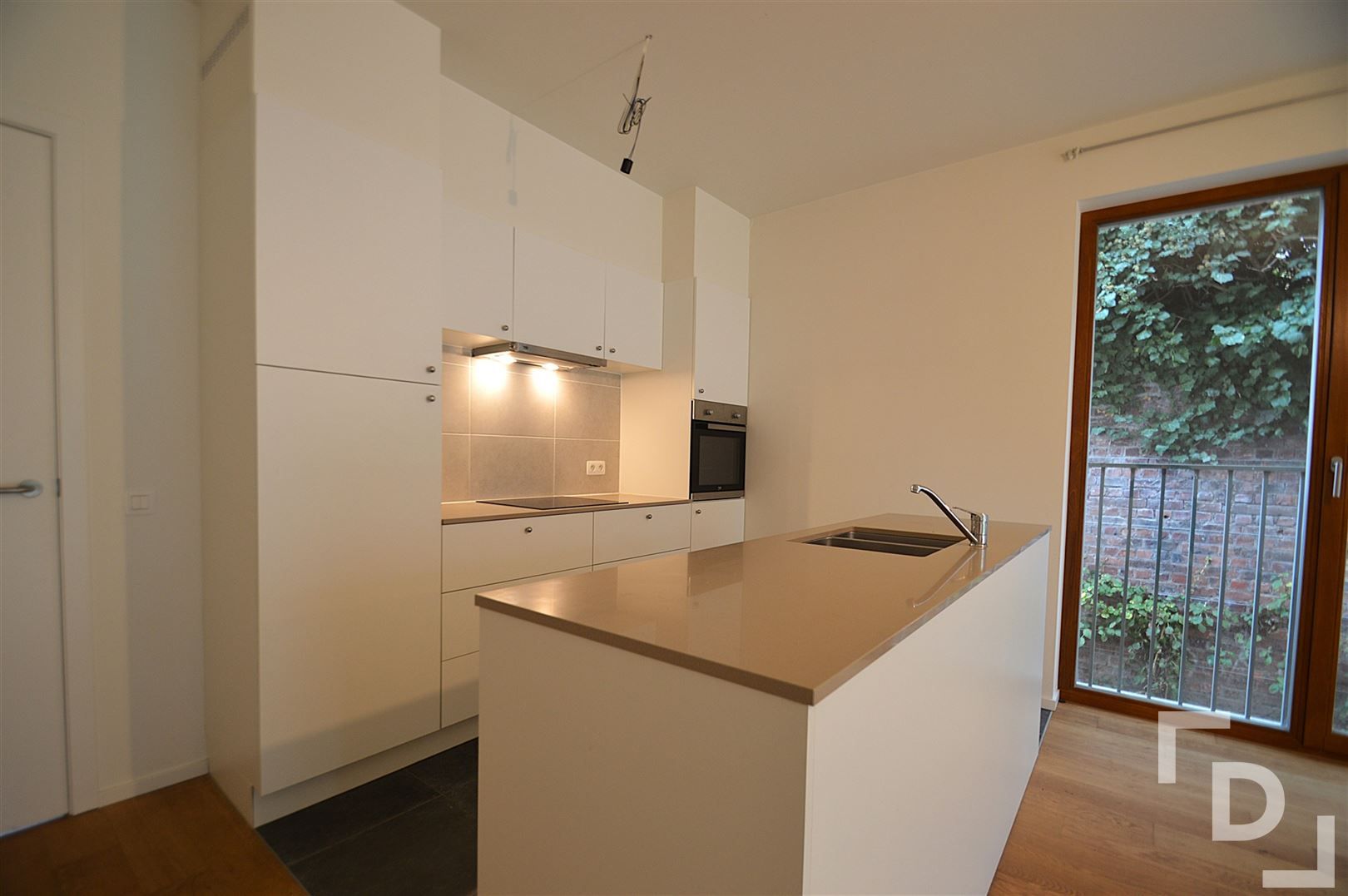 Gelijkvloers appartement met tuintje. foto 4