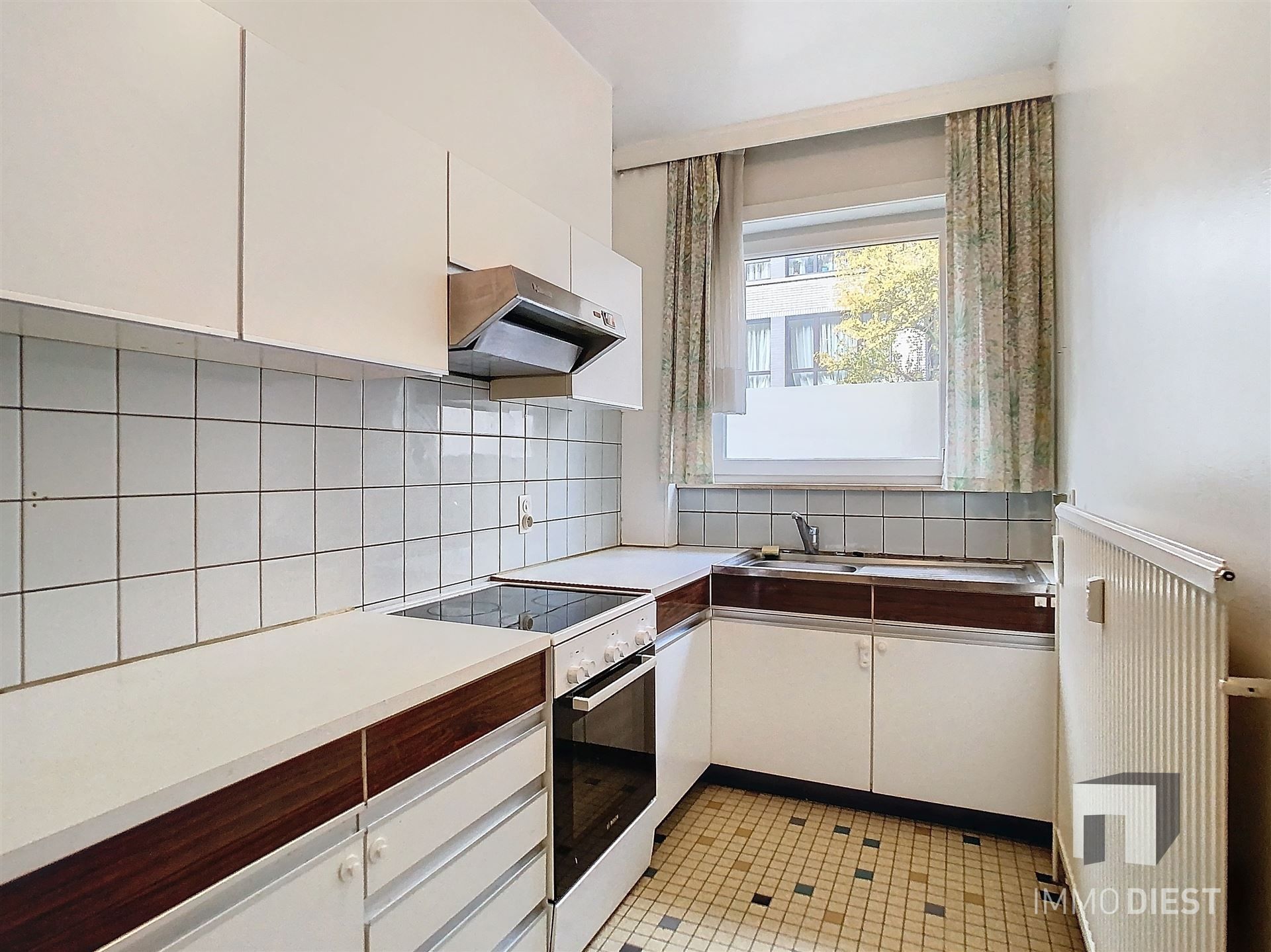 Gelijkvloers appartement met koer en 2 ruime slaapkamers foto 4