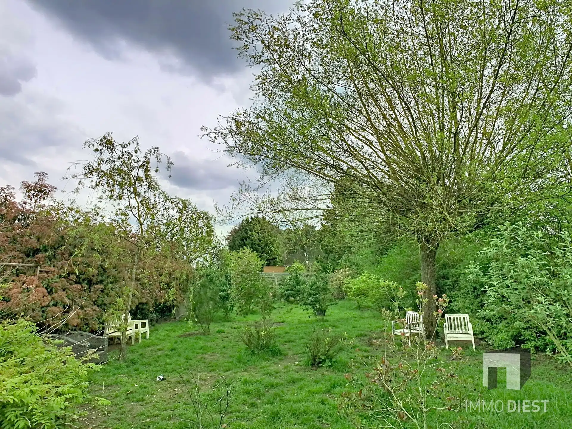 Charmante, op te frissen woning met ruime tuin nabij het centrum van Herselt. foto 3
