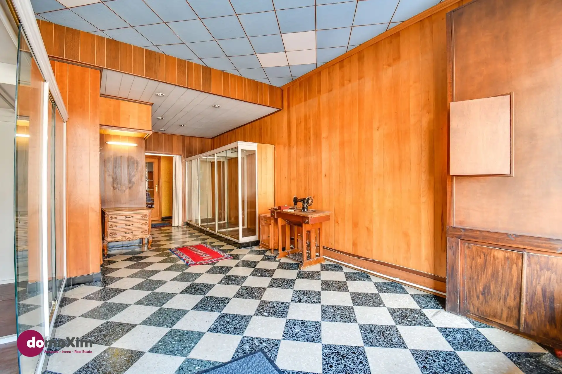 Te renoveren stadswoning met zuid-gerichte tuin en garage foto 2