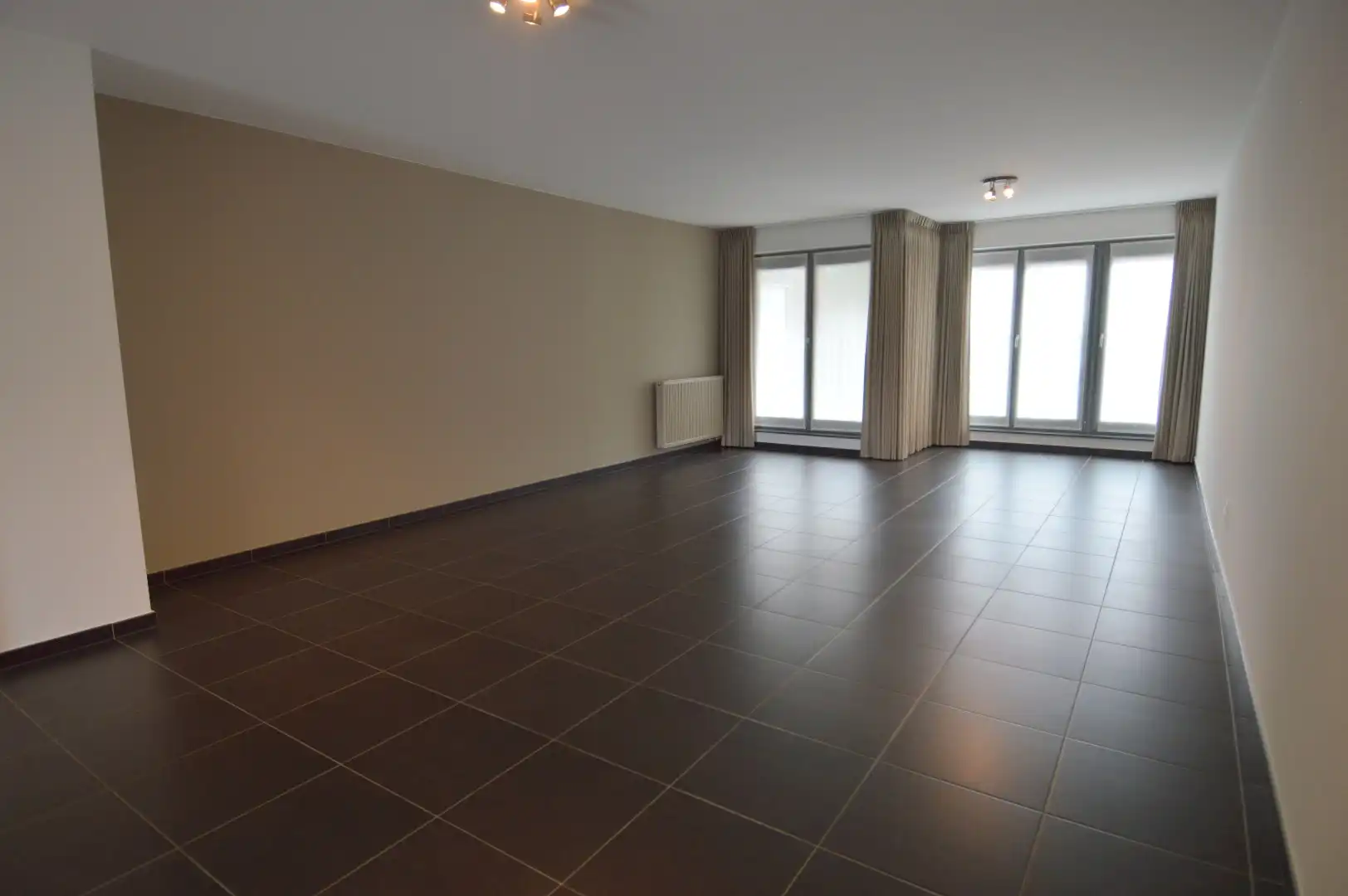 Ruim appartement met 2 slaapkamers, 2 terrassen én garage in het centrum van Harelbeke foto 5