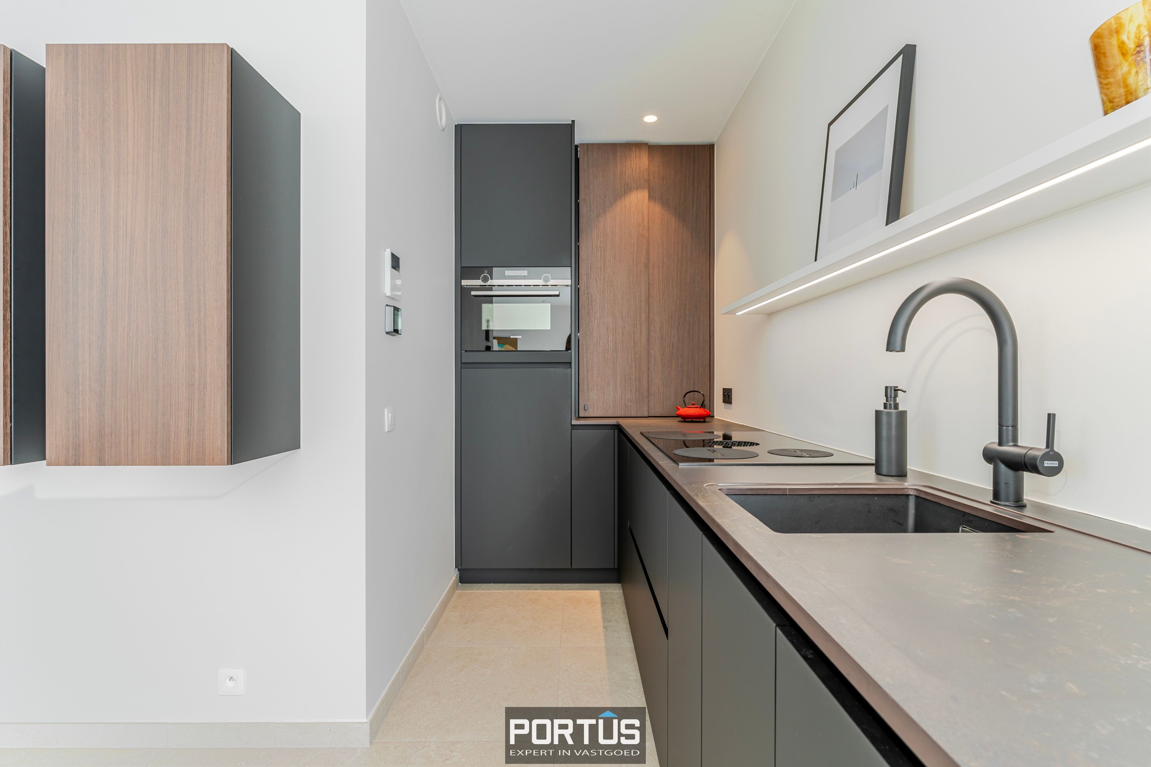 Recent instapklaar gelijkvloers appartement met 2 slaapkamers te koop foto 11