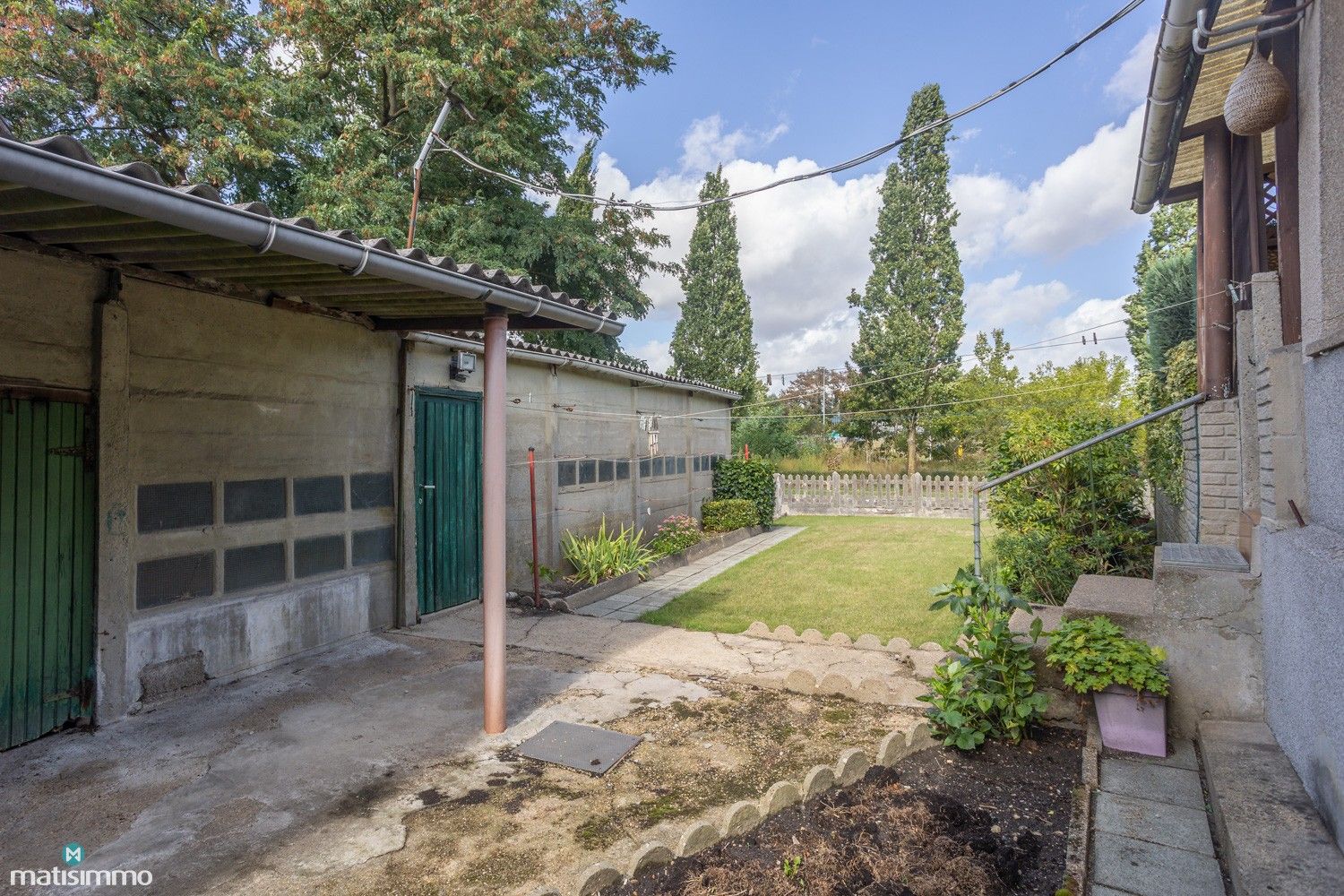 CHARMANTE EN GEZELLIGE WONING MET 4 SLAAPKAMERS, RUIME VRIJSTAANDE GARAGE EN TUIN TE GENK foto 32