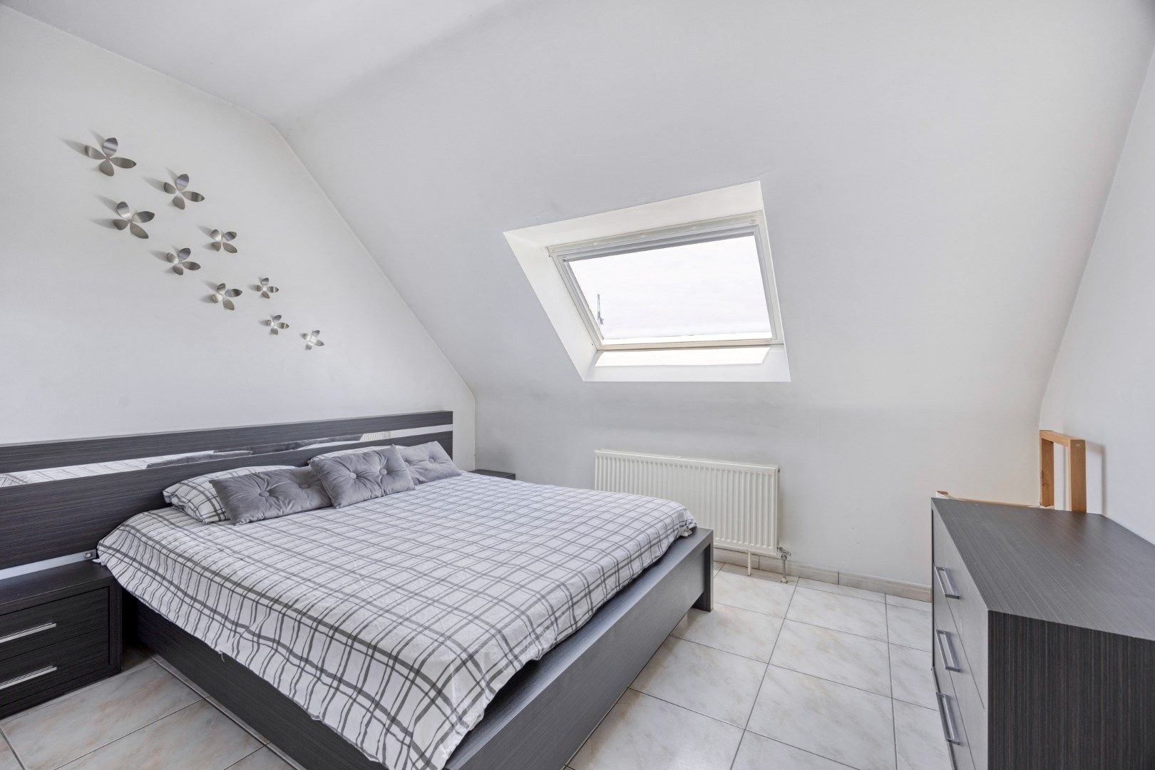 Ruim en licht appartement met 2 slaapkamers én zolderruimte foto 13