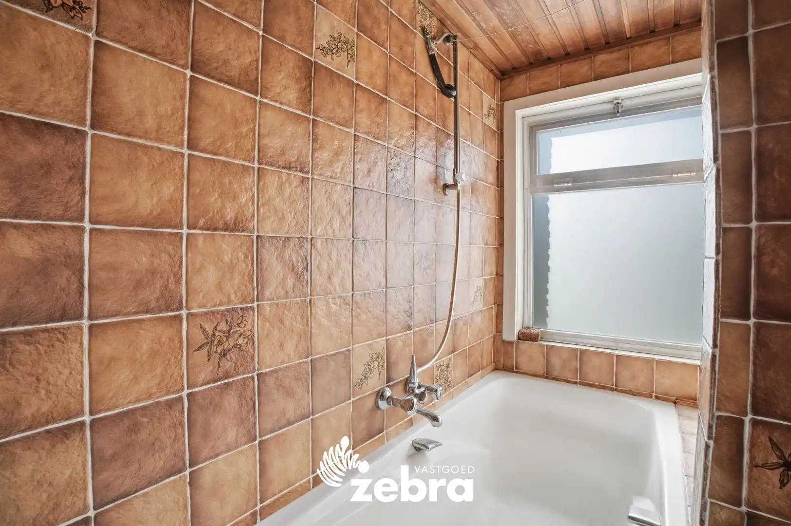 Op te frissen woning met veel potentieel, tuin en garage nabij het centrum van Tielt! foto 10