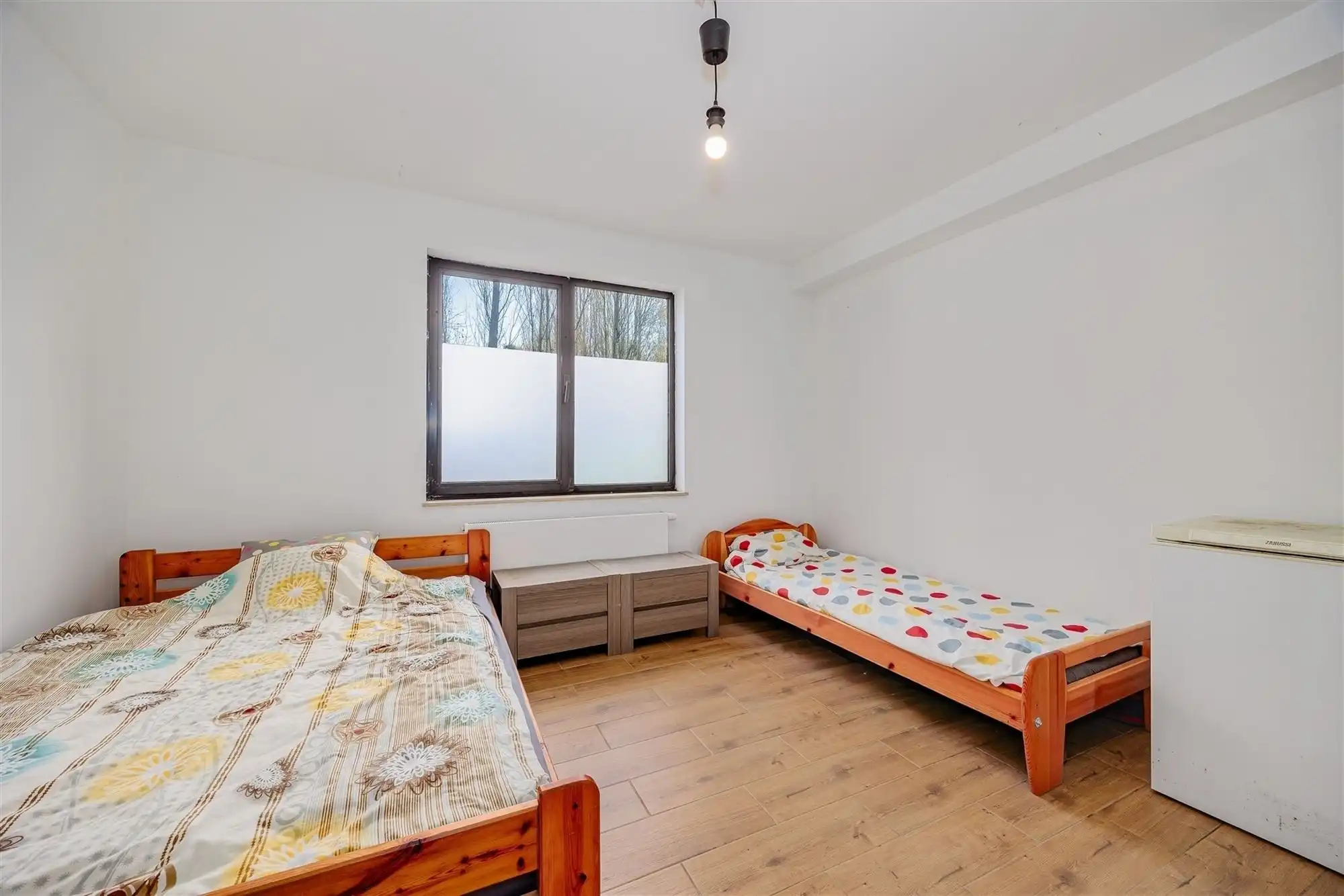 Instapklaar 2 slaapkamer appartement met gezellige tuin foto 12