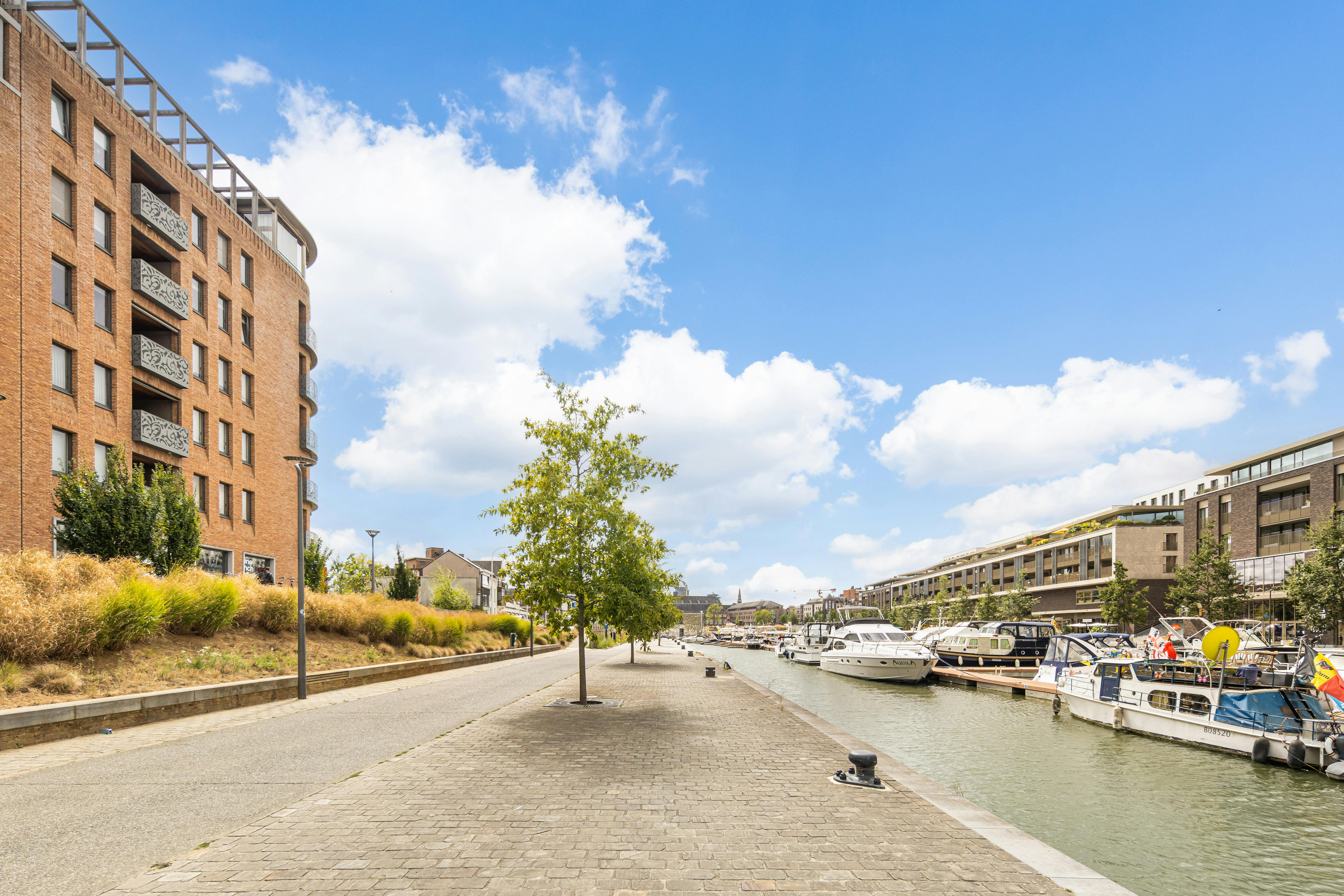 Exclusief hoekappartement aan het water met ruim zonneterras foto 21