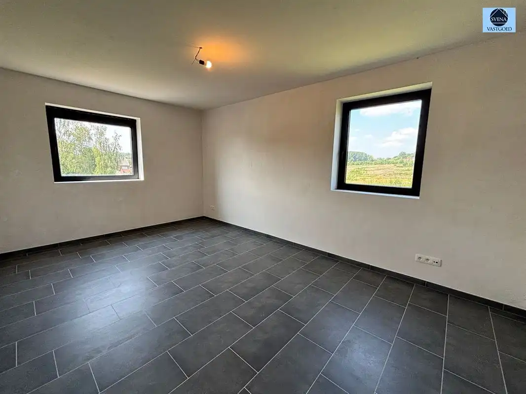 INSTAPKLARE BEN-WONING MET KELDER, GARAGE EN ZONNIGE TUIN IN ASPELARE foto 9