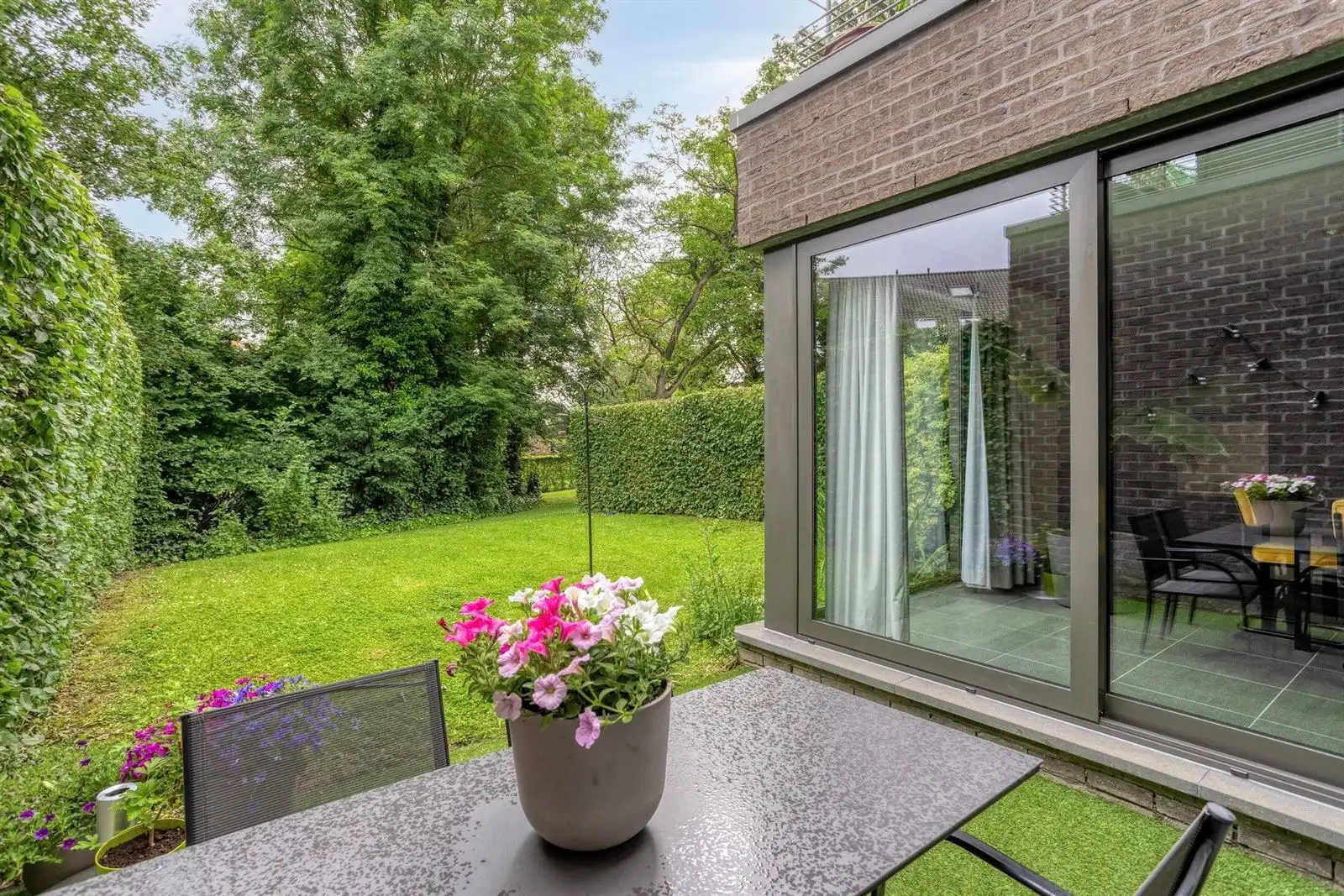 Gelijkvloers appartement met 2 slaapkamers en tuin, kelder & staanplaats foto 23