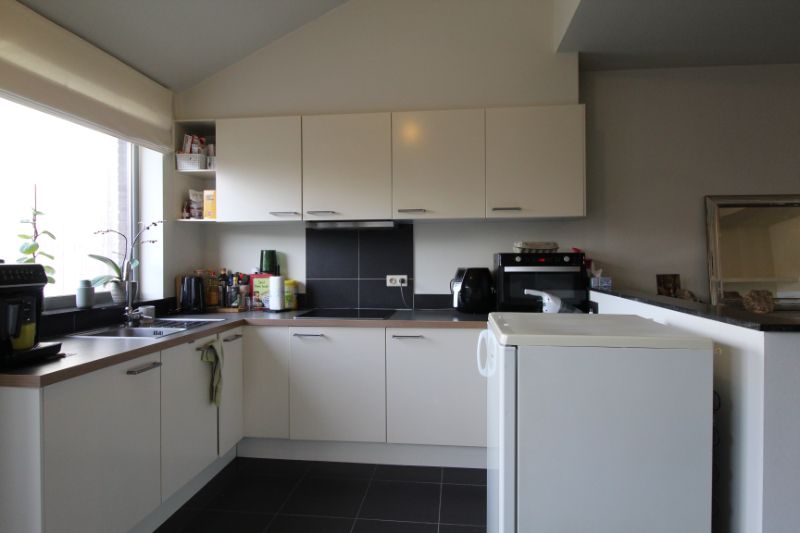 Gezellige woning met ruime tuin te huur in Dadizele foto 4
