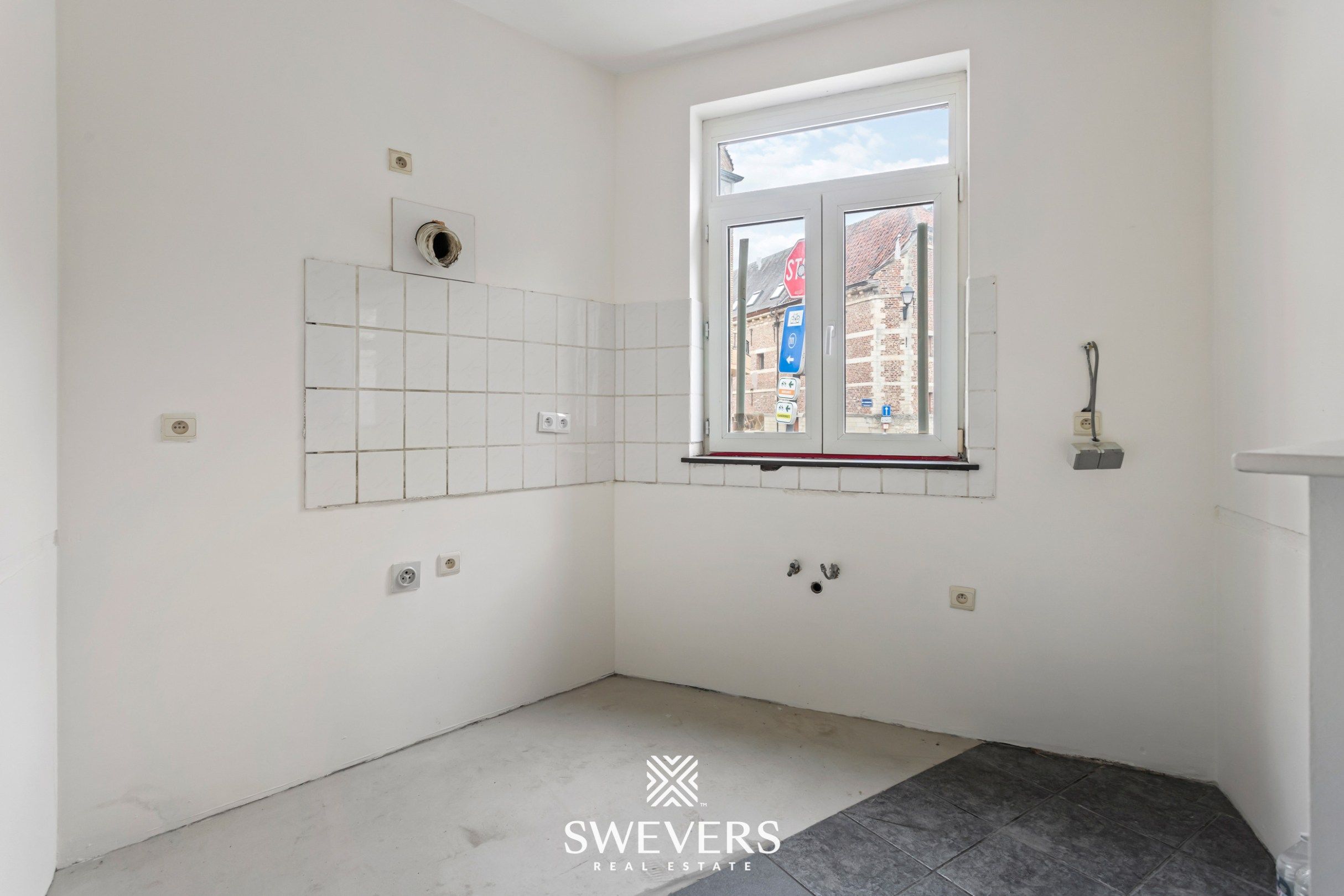 Charmante hoekwoning met potentieel in hartje Tongeren foto 7