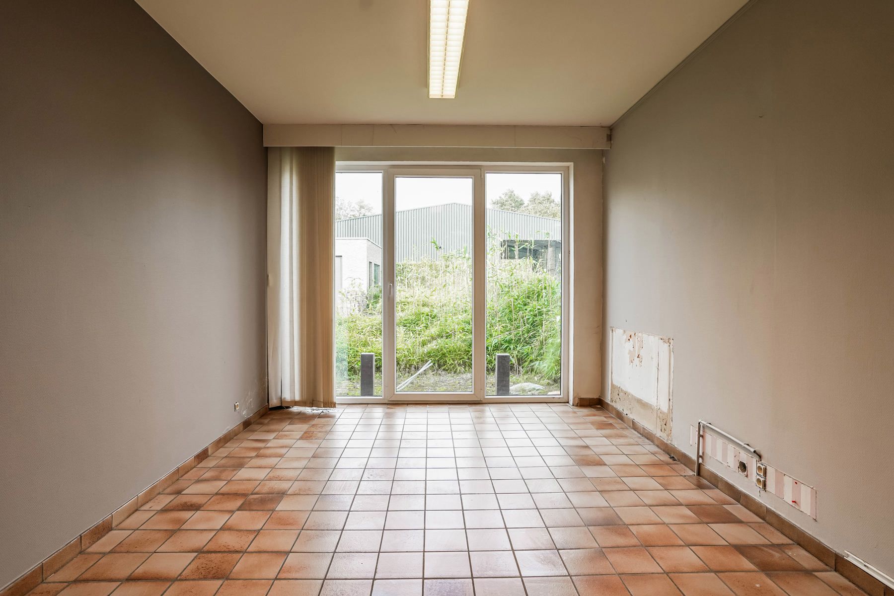 Veelzijdig, zeer ruim pand (handel én woonst) met tal van mogelijkheden in centrum Malderen! foto 11