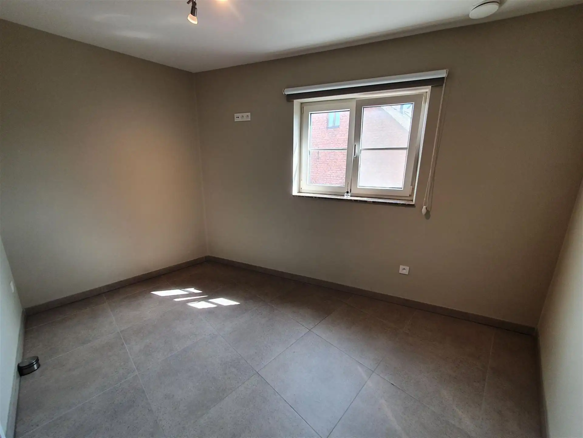 Ruim Appartement 2 Slpk met Groot Terras 20m² + Garagebox foto 3