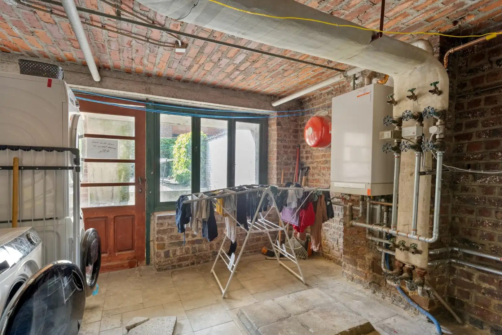Super gelegen opbrengsteigendom bestaande uit 3 appartementen met tuin in het centrum van Tienen, EPC label C foto 42