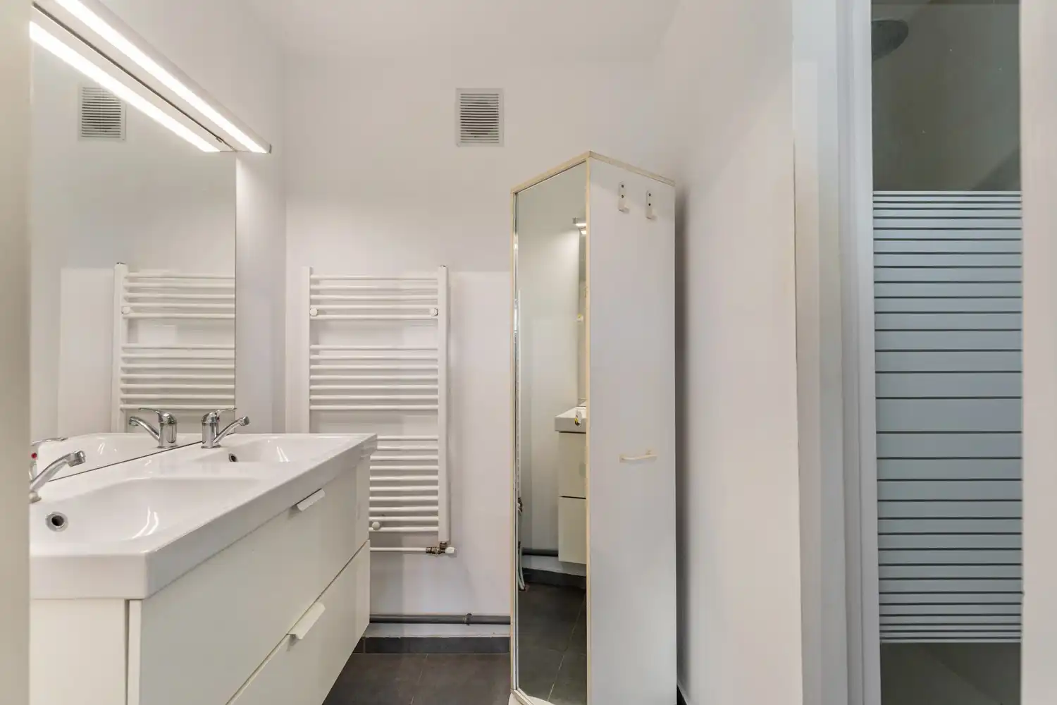 Gerenoveerd en lichtrijk appartement met 2 mooie slaapkamers, een ruim terras en een garagebox te Herent! foto 16