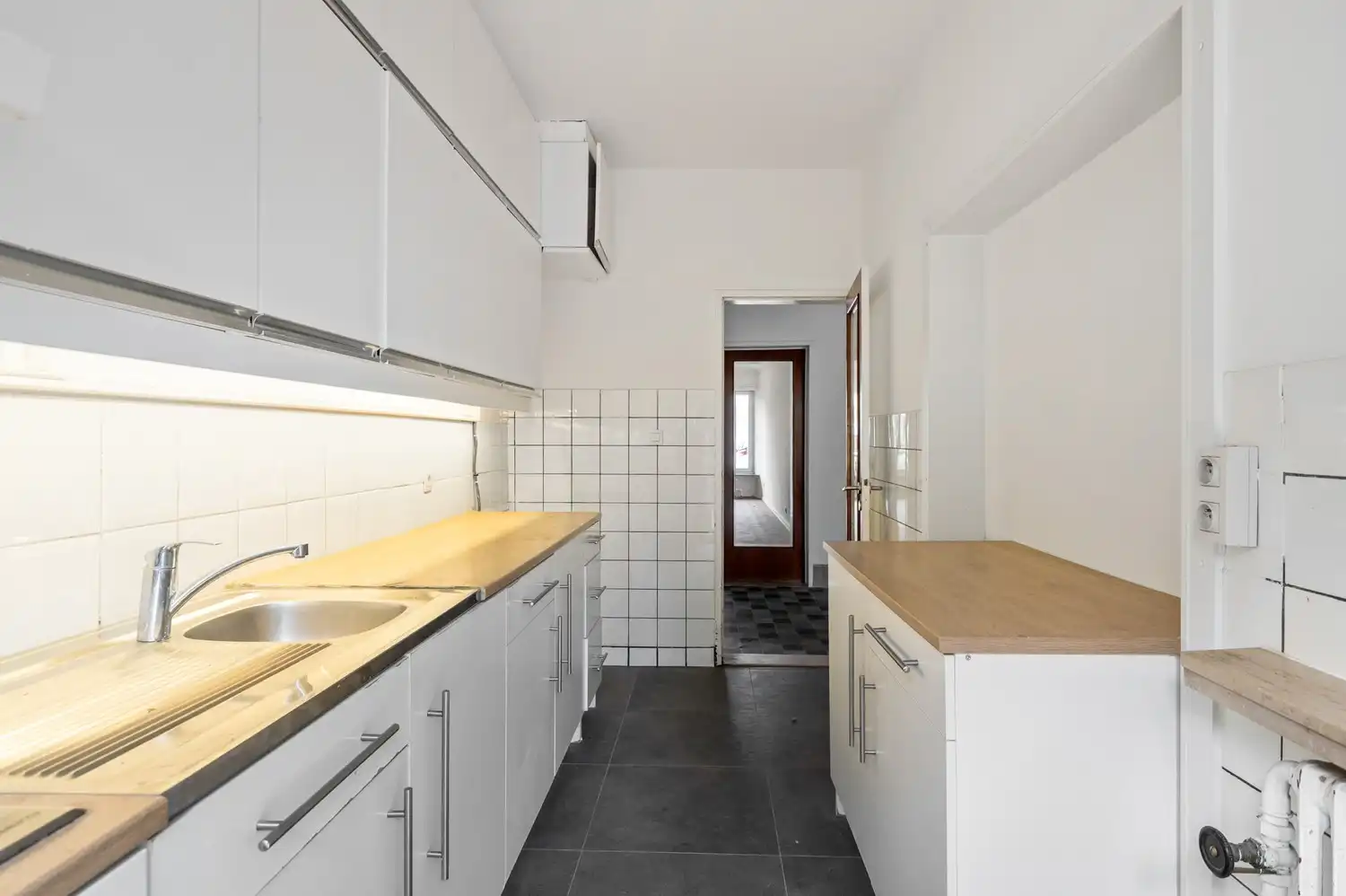 Ruim gelijkvloers appartement met 3 slaapkamers, tuin en garage! foto 7