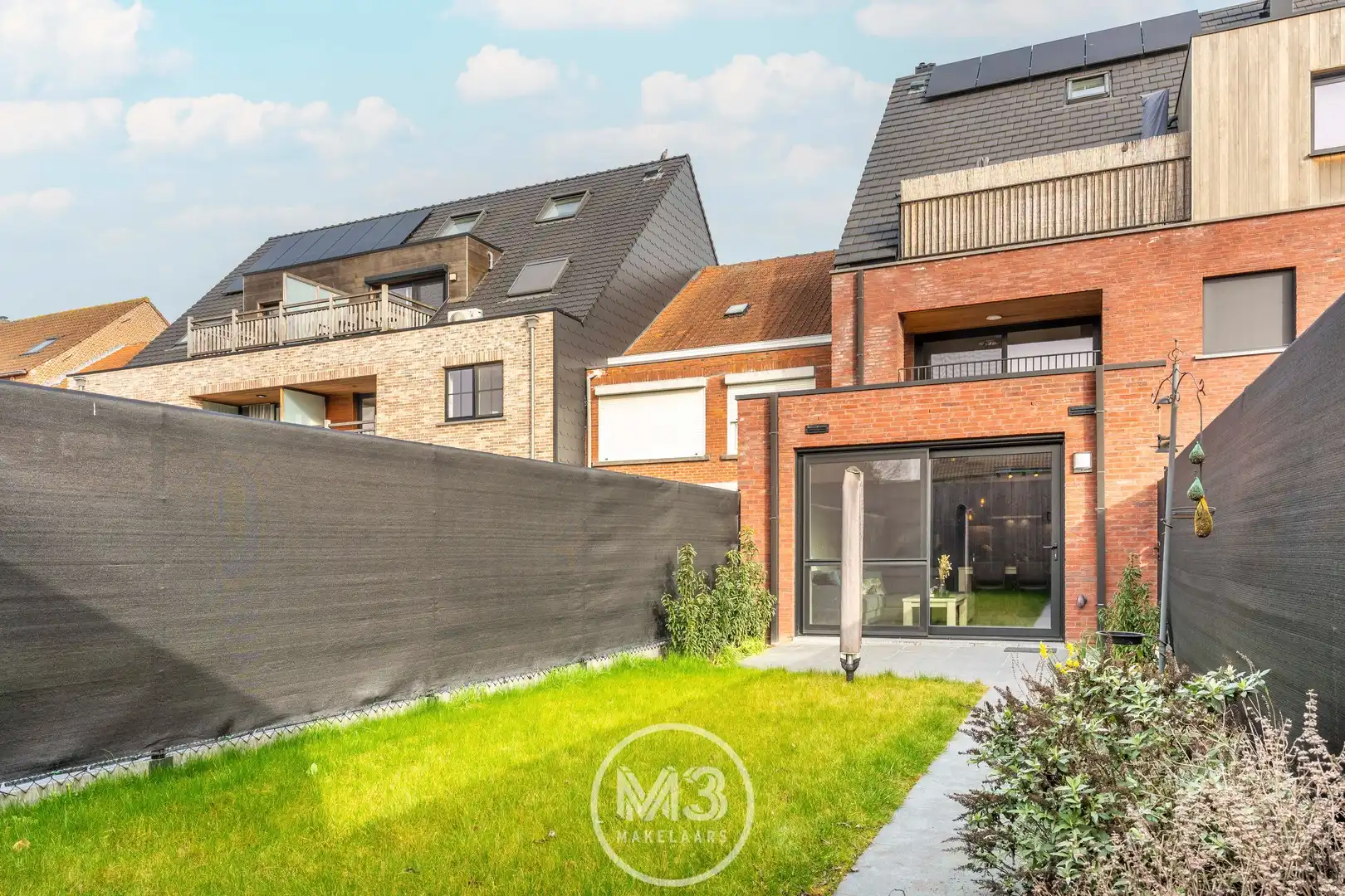 Gelijkvloers appartement met tuin en garage foto 5