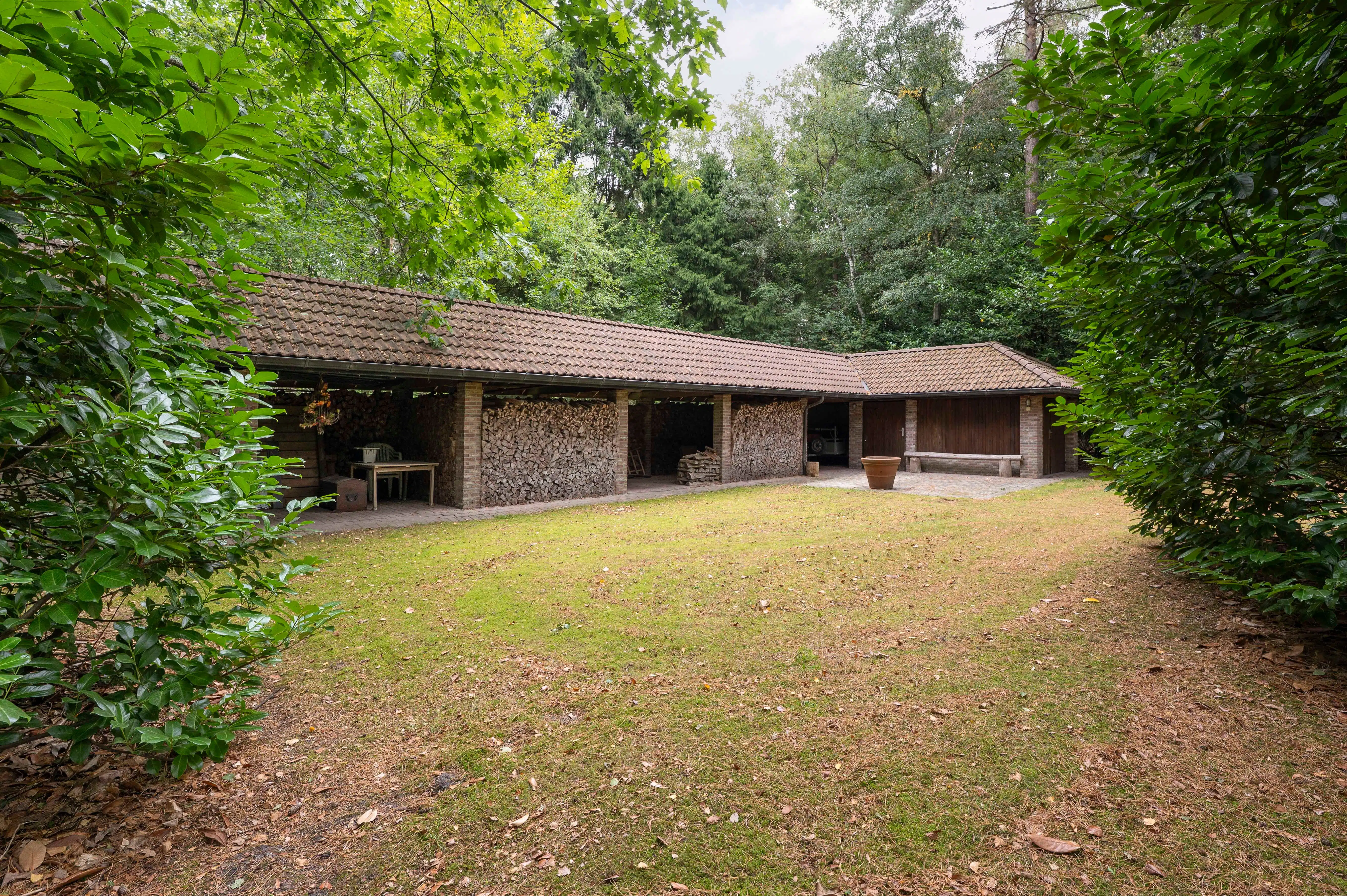 Architecturale sixtieswoning in volledige privacy en uniek natuurlandschap! foto 26