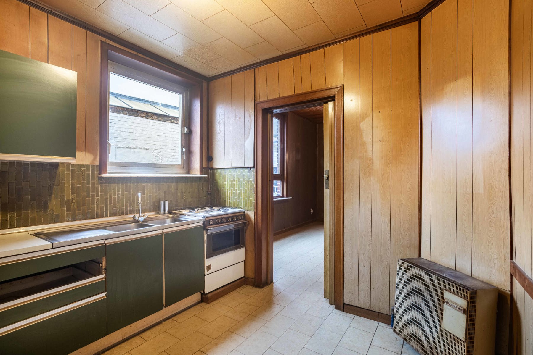 TE RENOVEREN RIJWONING MET TUIN EN GARAGEBOXEN foto 10