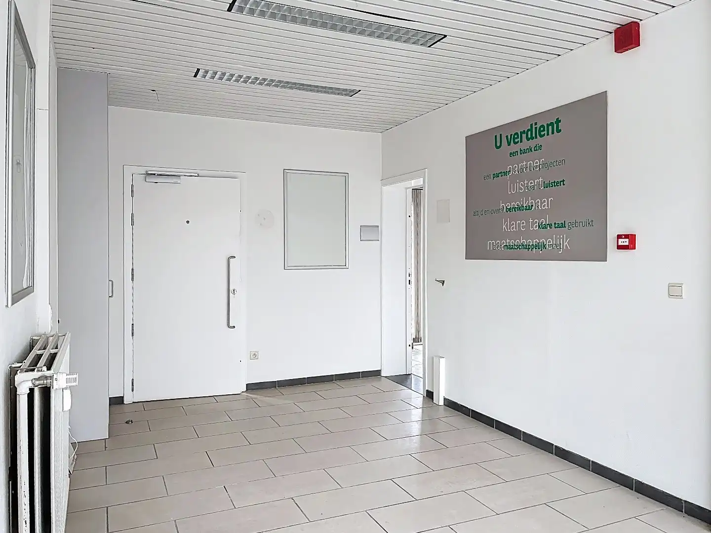 Veelzijdig pand op topligging: wonen en werken of tweewoonst met terrassen en garage foto 4