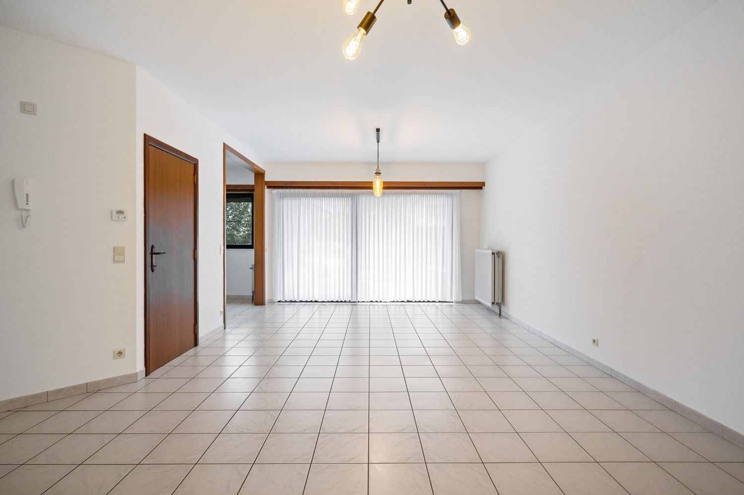 Ruim gelijkvloers appartement met tuin op toplocatie nabij centrum Vremde. foto 5